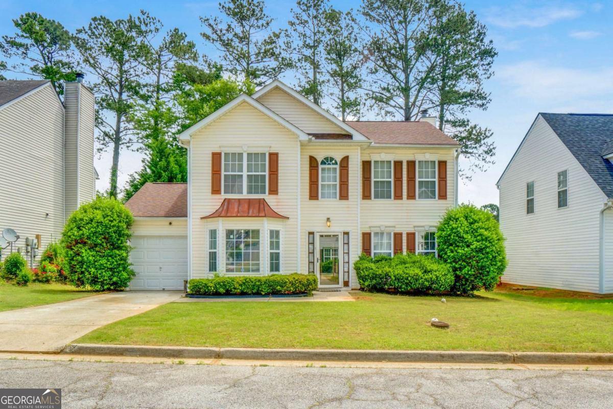 Welcome to this charming two-story home, impeccably maintained and truly move-in ready. With 4 spacious bedrooms and 2.5 bathrooms, it offers the perfect space for the whole family to enjoy. On the main level, you'll find an elegant formal dining room, a versatile flex space ideal for a home office or playroom, and a cozy family room with a fireplace that flows seamlessly into the kitchen-the true heart of the home! Upstairs, the expansive primary suite provides a private retreat with its own en-suite bath, along with three additional bedrooms that are perfect for family, guests, or that extra space you've always wanted. Designed to blend everyday living with special gatherings, this home offers comfort, style, and the ideal location within a welcoming community. Don't miss this amazing opportunity!
