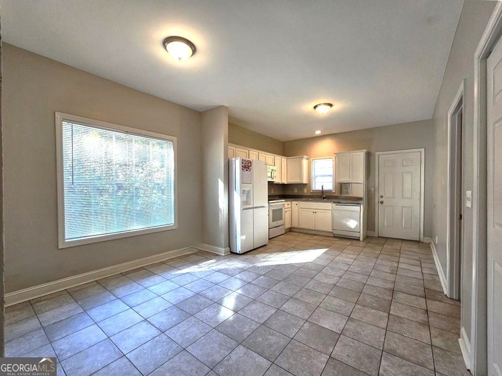 Photo of 718 N Evelyn Place NW, Atlanta, GA 30318 (MLS # 10793924)