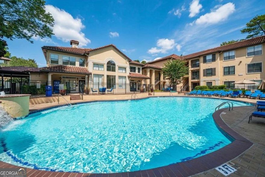 Perfect first floor unit for pet owners or grocery hauls. This is low-maintenance, high-comfort living at its best. Welcome to this rare first floor 2 bedroom, 2 bath gem in the coveted Peachtree Place community where convenience, privacy, and charm come together. This unit doesn't share any perimeter walls, and it's been lovingly maintained by the original owner. Two assigned parking spaces are ideally located on the first floor of the parking deck, right next to a handicapped space. Inside, you'll find brand new luxury vinyl plank flooring in the bright and open living and dining areas, with direct access to your private patio. Steps from the community grill, ideal for easy outdoor dinners. The kitchen features granite countertops and plenty of cabinet space, while both bedrooms include walk-in closets. The vaulted ceiling in the primary suite adds an elegant touch. Enjoy premium amenities like twice-weekly doorstep trash pickup, AT&T fiber internet, a pool, clubhouse, fitness center, business center, and more. All within a gated, beautifully maintained community. Come see it today!