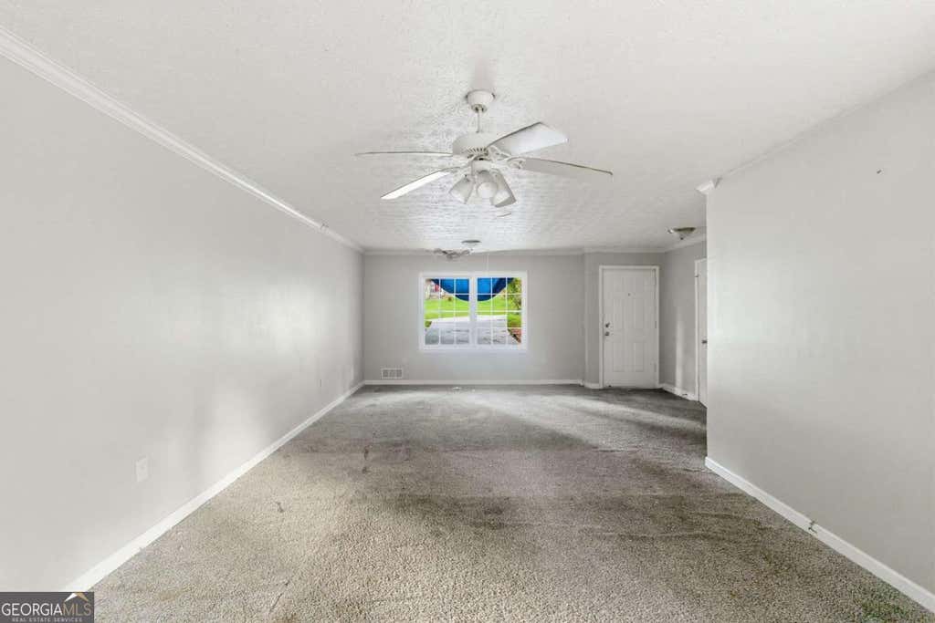 Photo of 837 Hemingway Road, Stone Mountain, GA 30088 (MLS # 10815136)