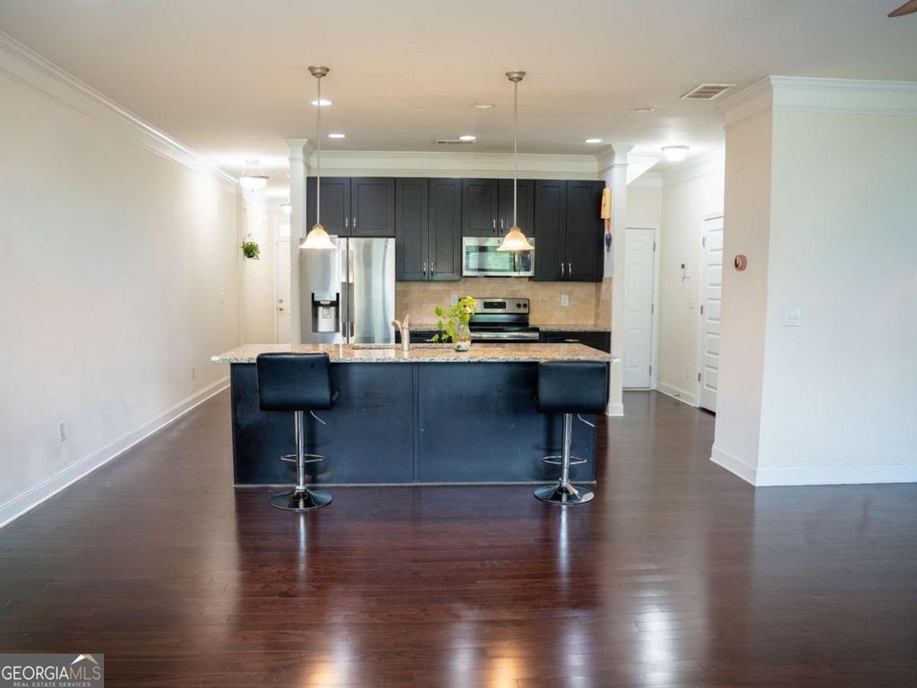 Photo of 10643 Naramore Lane, Alpharetta, GA 30022 (MLS # 10741094)