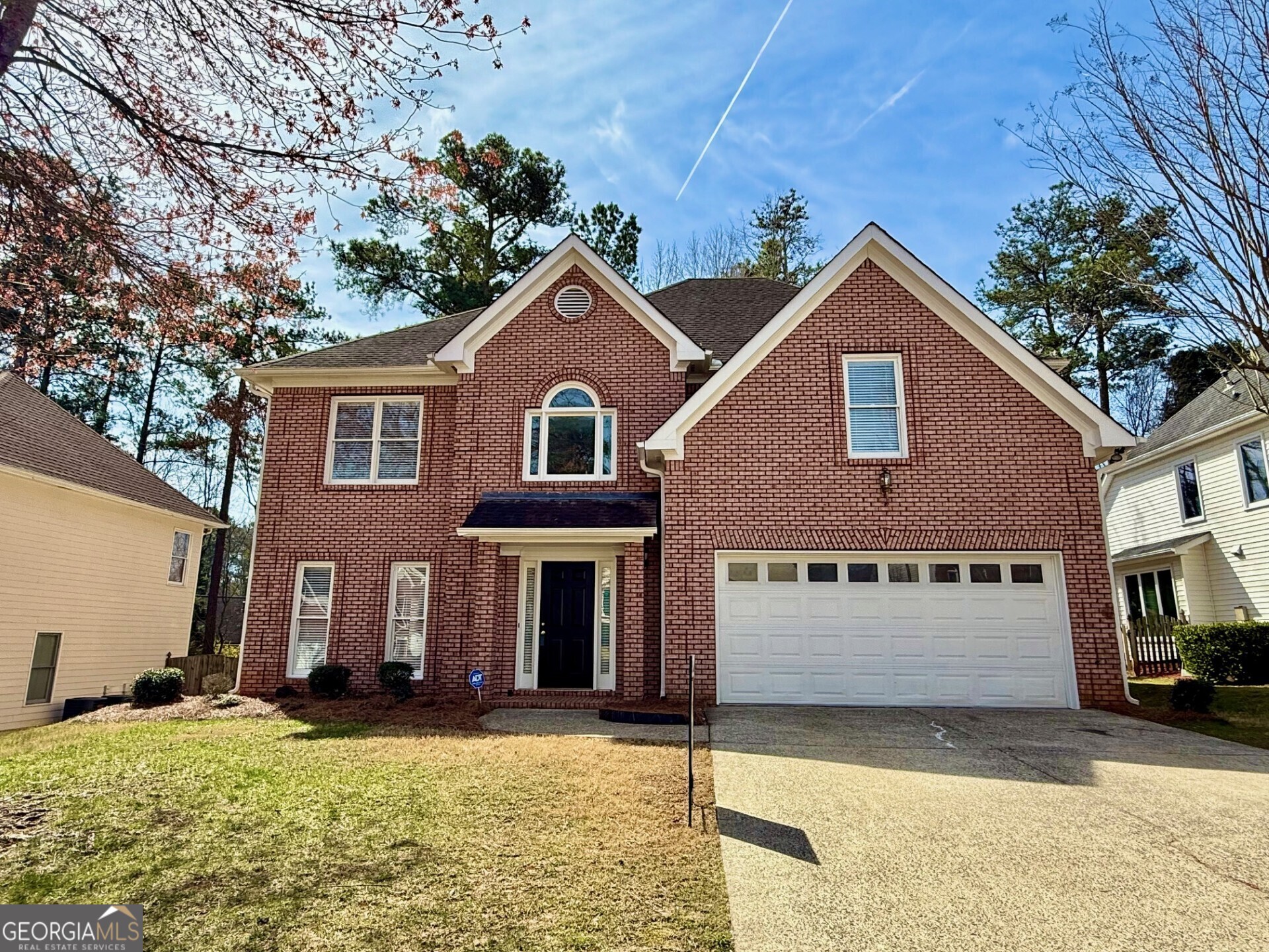Open and bright, brick front beauty, 4 bedrooms 2 full and 1 half bath, fresh paint interior, new carpet, new LVP floors, new light fixtures. Two story foyer, two story family room, formal living room, formal dining room plus an office at main, granite countertop at kitchen, new whirlpool appliances: new stove, new microwave, new dishwasher. 2nd floor oversized master bedroom, 3 bedrooms with double vanities at master bathroom and hallway bathroom, level lot, fenced back yard. Community features a clubhouse, pool, playground, pickle ball, tennis and basketball, convening to hwy 75 / 575, shopping, park, move in ready.
