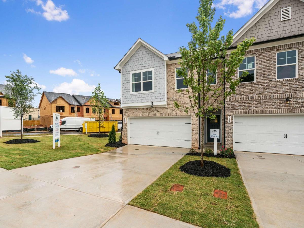 NEW CONSTRUCTION BEAUTIFULLY CRAFTED TOWNHOMES IN A PARK-LIKE SETTING ON COBB COUNTY'S RAPIDLY RISING SOUTH SIDE. Townhome Community will feature 90 Units and include two Dog Parks/Fire Pit-Pavilion for residents' enjoyment. Tucked away in the up-and-coming City of Mableton, Crawford Creek Communities is proud to introduce Caldwell Park Co aptly named for its park-like collection of wooded grounds, greenspaces and ponds. A veritable urban-suburban oasis poised just off Old Bankhead Highway, this luxury two-story townhome community affords its residents the best of both worlds. In addition to its tranquil picturesque setting, homeowners will enjoy ease-of-access to VeteranCOs Memorial Highway, I-20 and I-285 with the glistening lights of the Atlanta skyline just 15 miles away, the boutiques and eateries of Smyrna-Vinings within 10 miles, and the trails, ruins and reservoir of the 2,549-acre Sweetwater Creek State Park less than 8 miles away. Experience the thrills of the rollercoasters at Six Flags Over Georgia and baseball games at nearby Truist Park in the Spring and Summer, the change of seasons from the top of Kennesaw Mountain in the Fall, and regular treks into Atlanta year-round for its world-class assortment of shops, restaurants and attractions like World of Coca-Cola, Atlanta Botanical Gardens, Georgia Aquarium, High Museum of Art, Piedmont Park and more. As for Caldwell Park itself, 90 modern farmhouse-influenced townhomes line the streetscapes and central mews of this South Cobb community. Two dog parks, pavilion and community firepit will serve as the neighborhood social hub, while a series of greenspaces serve as inspiration for picnics in the CparkC and the occasional game of flag football. With indoors every bit as inviting as the outdoors, Caldwell Park boasts two imaginative floor plans from which to choose Co The Brighton and The Brookside. Both feature three bedrooms, two-and-a-half-bathrooms, open concepts at their core, rear patios for outdoor living and front entry two-car garages. Chef-inspired kitchens offer large islands with a wonderful vantage point of the adjoining rooms, and fireplaces in the family rooms hold the promise of countless winter nights cast in the firelightCOs glow. While each floorplan offers an upper-level loft as a terrific option for a secondary gathering space, The Brookside provides the option to convert the loft to a fourth bedroom. Bedrooms are thoughtfully placed for privacy in both plans Co with the secondary bedrooms at the front of the home and the sprawling and serene OwnerCOs Suite at the rear, overlooking the backyard. This unit includes upgrades already in the price - Hardwood tread staircase, Quartz countertops in the kitchen with pendant lights, Tiled floors in the master bath, secondary baths and laundry, Tiled shower walls in the master. Additional options may be added and selection may be made if not past our deadlines of construction.