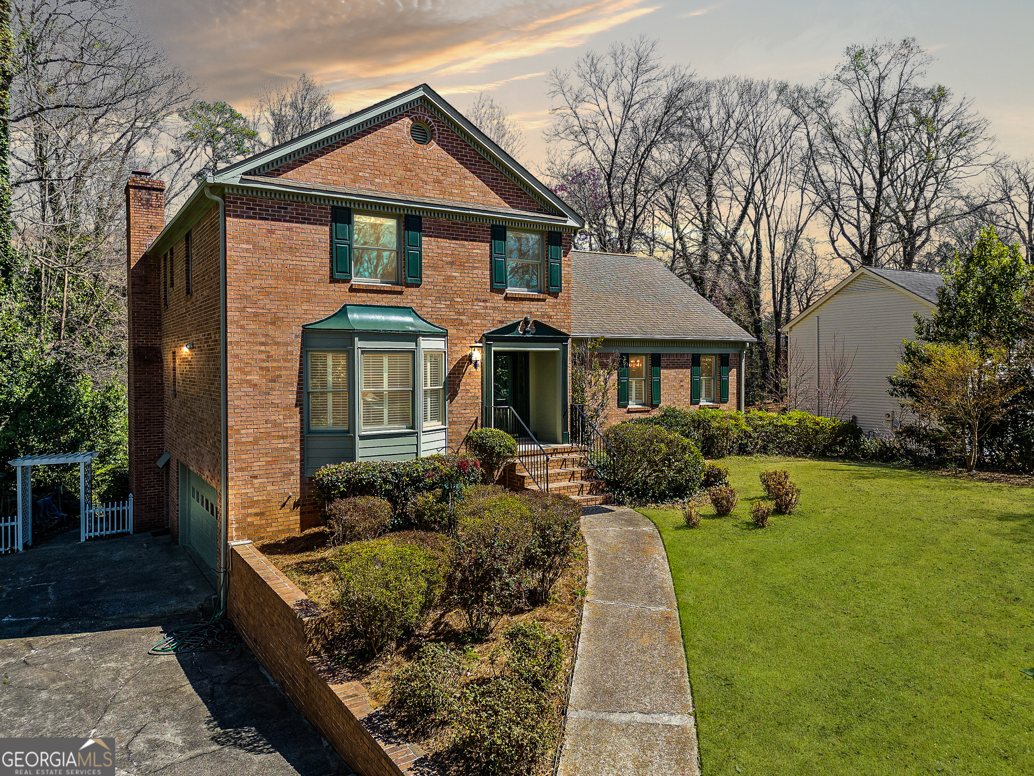 Welcome Home to Gant Quarters/Millbrook Farms Tucked away in the sought-after Gant Quarters/Millbrook Farms community, this stunning brick home offers the perfect blend of tranquility and convenience. Set at the end of a quiet cul-de-sac, it provides a private retreat among mature hardwoods while keeping you close to I-75/I-285, The Battery at Truist Park, three Chattahoochee River parks, Terrell Mill Recreation Center, and East CobbCOs best shopping and dining. From the curb, timeless brickwork and designer landscaping create an inviting first impression. Step inside the foyer, and youCOll find an elegant balance of charm and function, with multiple spaces designed for gathering and entertaining. A formal sitting room sets a refined tone, while the spacious family roomCowith custom built-ins and a brick wood-burning fireplace (plus a gas starter)Coinvites you to relax. A third flexible living area can serve as a playroom, guest suite, or home office, complete with its own full bath. The heart of the home is a chefCOs dream kitchen, thoughtfully updated with a Wolf gas stove-topped island, double ovens, endless counter space, and custom solid cherry cabinetry. A large, elegant dining room easily accommodates a 12-seat table and buffet, perfect for hosting neighborhood dinner clubs and holiday gatherings. Just behind the kitchen, a combined laundry and pantry space offers extra storage and a private half bath for added convenience. Step outside to a peaceful screened sunroom, perfect for morning coffee, or fire up the grill on the deck overlooking the fenced, grassy yardCoa natural oasis with plenty of room to play and entertain. Upstairs, five oversized bedrooms include an updated primary suite with walk-in storage and two additional full baths. Need more space? Head downstairs to the finished basement, featuring a second fireplace, a cozy den, workout and office areas, a dedicated workshop, and a huge garageColarge enough to fit cars and even a bass boat. Thoughtful upgrades like custom plantation shutters, glowing solid hardwood floors, high-end windows, and exquisite millwork add to the homeCOs warmth and character. Spacious yet efficient, polished yet invitingCothis is a rare gem in one of East CobbCOs most cherished communities. Come see it for yourself and fall in love!