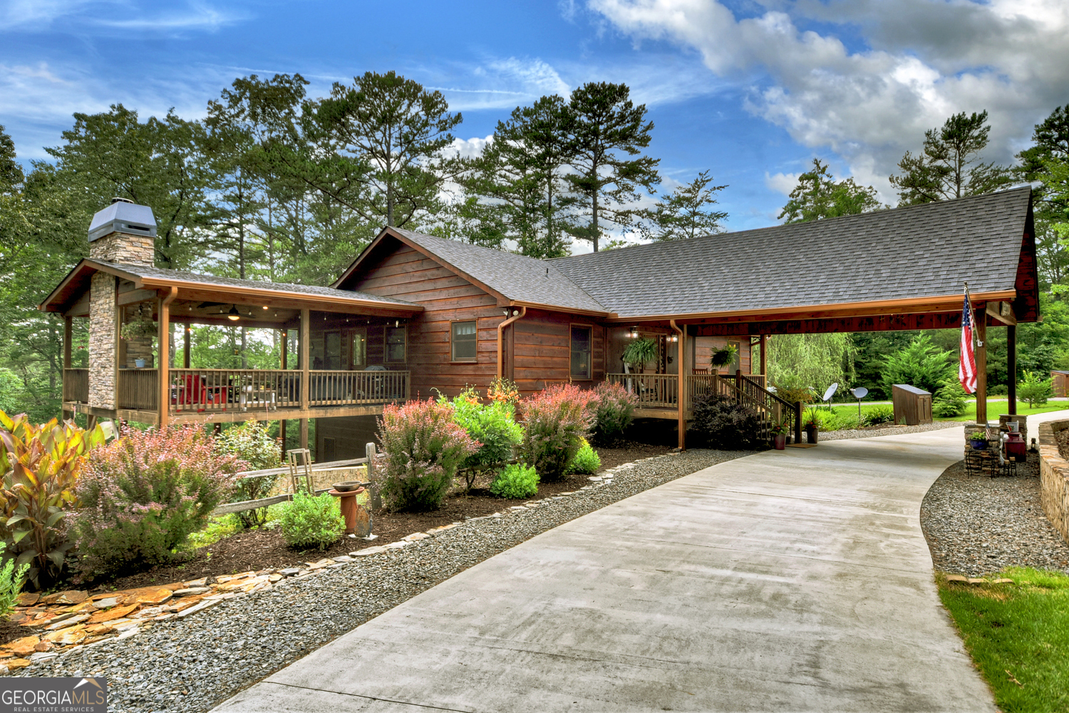 Welcome to your dream retreat in the mountains! This beautiful and well-maintained 3-bedroom, 2.5-bath home offers the perfect blend of modern comfort, rustic charm, and outdoor living. Step inside to find an open and inviting layout with warm wood finishes, abundant natural light, and thoughtful upgrades throughout. The spacious master suite is a true sanctuary, featuring a huge custom walk-in closet and a luxurious tiled shower in the private en-suite bath. The heart of the home is designed for both relaxation and entertaining, with an inviting living area with cozy fireplace, and a covered outdoor deck that feels like an extension of your living space. Out here, you'll enjoy a fireplace, mounted TV, and dual grills - ideal for hosting gatherings or simply enjoying quiet evenings. Downstairs, the fully finished basement offers incredible flexibility with two bedrooms, a kitchenette, full bathroom, living and dining area, ample storage, and a separate entrance - perfect for guests or multigenerational living. Outside, enjoy professional landscaping, mature garden beds, thriving blueberry bushes, a matching storage shed, and peaceful mountain surroundings. Nearly all furniture stays, and all appliances are included, making this a truly move-in ready opportunity. Don't miss your chance to own this incredible mountain home that checks every box. Whether you're looking for a full-time residence or vacation home this one has it all!