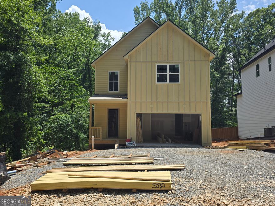 New Construction - This two Story Home has 4 Bedrooms & 3.5 Bathrooms that Features an Open concept Kitchen with quartz Counter tops, Tile Backsplash, Stainless Steel Appliances, Large Island w/ views to the Breakfast Area & Family room. Beautiful covered porch and huge coved deck. Large owner's suite room and private bath room with Large Walk-In Closet and freestanding tub. Laundry on the upper level. Home has a full unfinished Daylight basement, stubbed for bathroom, private back yard. Large two car garage. No HOA! Quiet neighborhood, easy highway access. Near Truist Park, shopping and restaurants. Southern Living Custom Builder. Estimated completion time July 2025.