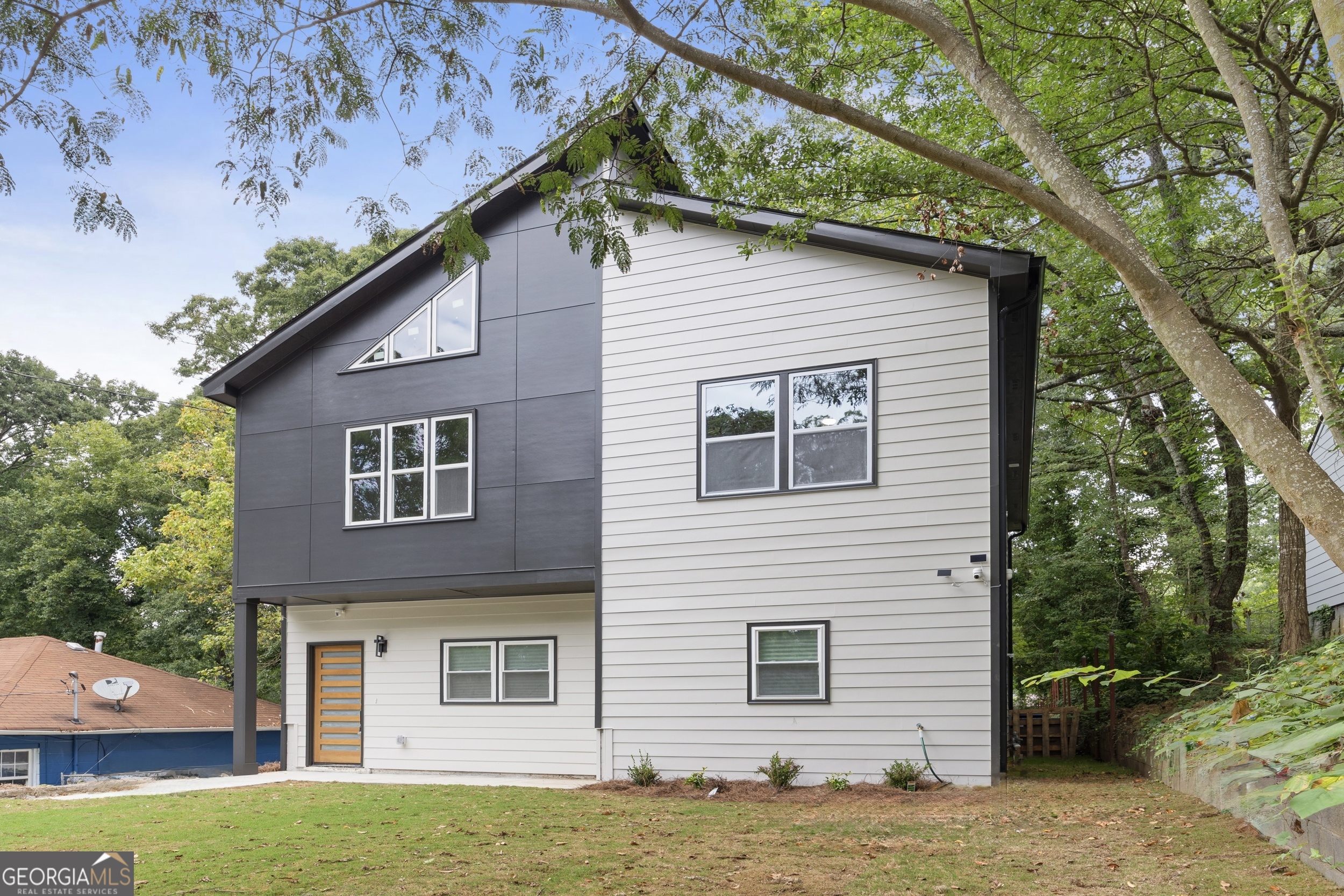 Welcome home to this beautifully renovated 4-bedroom, 3-bath home located in the highly sought-after Venetian Hills area of Atlanta. This stunning property offers modern upgrades with timeless design, just minutes from the BeltLine, Downtown Atlanta, Mercedes-Benz Stadium, and the vibrant dining and shopping of Lee + White and West End. Inside, you'll find an open-concept floor plan designed for both style and function. The gourmet kitchen features granite countertops, brand-new stainless steel appliances, and custom cabinetry, all flowing seamlessly into the dining and living areas perfect for entertaining or everyday living. Each of the three full bathrooms showcases designer tile work, with a spa-inspired primary bath offering a large tiled shower, double vanity, and oversized walk-in closet. The main level includes a versatile bedroom that can be used as a guest room or a private home office, providing flexibility to fit your lifestyle. Upstairs, a spacious laundry room adds convenience, while generous secondary bedrooms offer plenty of space for family or guests. With its blend of modern finishes, abundant natural light, and thoughtful renovations, this home is move-in ready and built for today's lifestyle. Don't miss this incredible opportunity to own a fully updated home in one of Atlanta's fastest-growing communities where history meets modern living and convenience is at your doorstep.