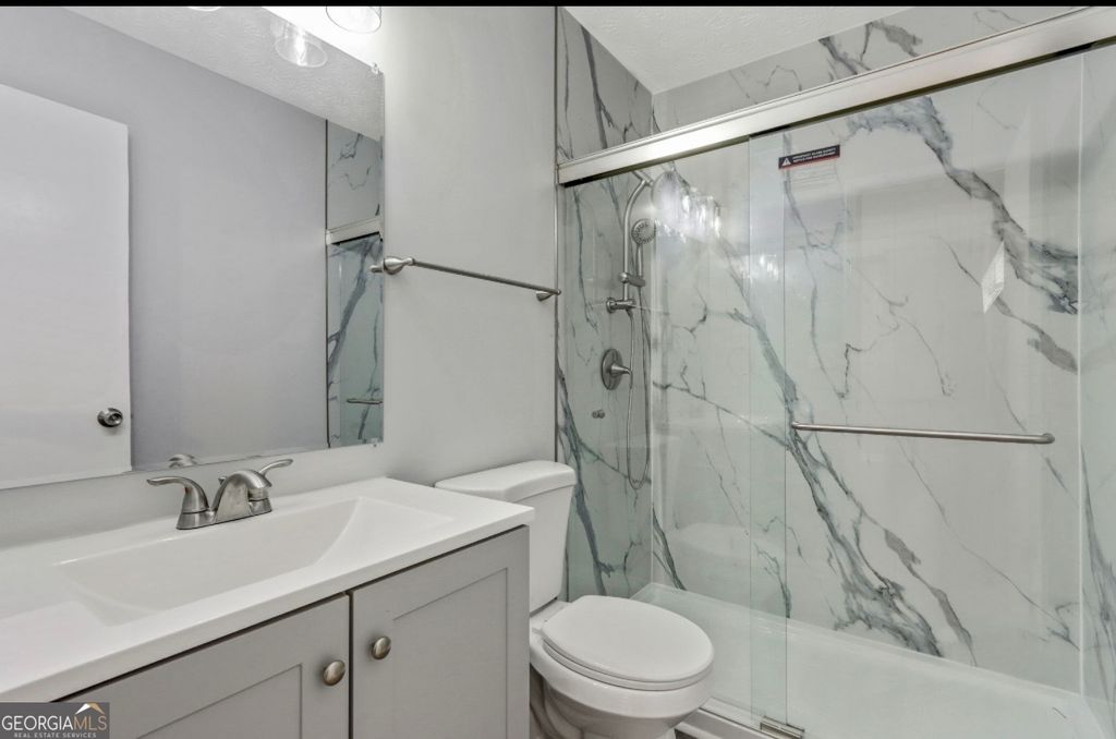 Photo of 8730 Parliament Place, Jonesboro, GA 30238 (MLS # 10741436)