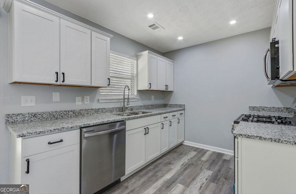 Photo of 8730 Parliament Place, Jonesboro, GA 30238 (MLS # 10741436)