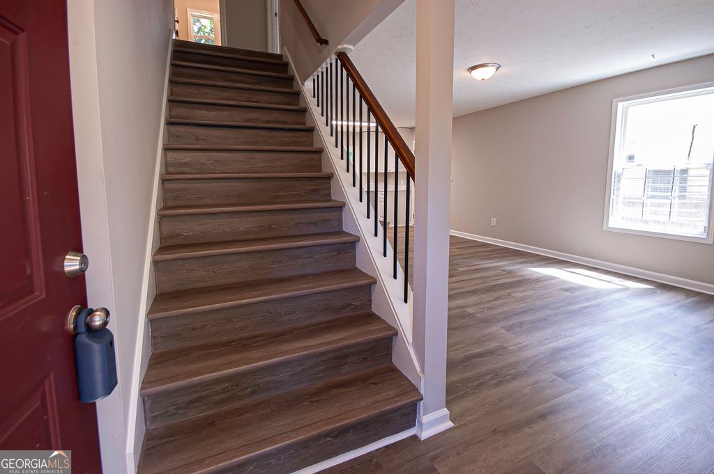 Photo of 8454 Hightower Trail, Snellville, GA 30039 (MLS # 10794344)