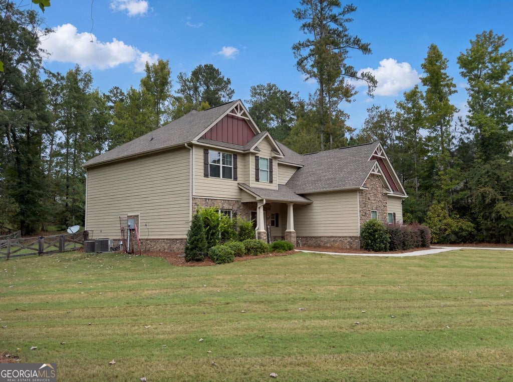 Photo of 130 Homestead Circle, Forsyth, GA 31029 (MLS # 10874757)