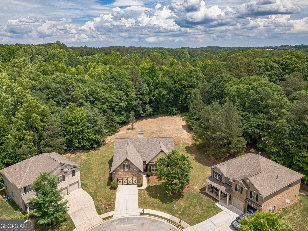 Photo of 997 Spanish Moss Trail, Loganville, GA 30052 (MLS # 10770672)