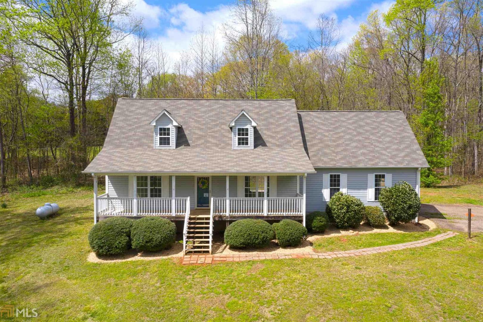 Refreshed and move-in ready! New flooring, new paint throughout, new lighting, new counters and much more! This 3 bedroom, 2.5 bathroom with bonus room home offers beautiful pasture view on 1.2 very private acres. Spacious kitchen with lots of beautiful Oak cabinets, new stainless steel appliances, new counter tops, new sink & faucet, new LVP flooring. Fireplace in living room. Large bedrooms with walk-in closets. Rocking Chair Front Porch and great deck off the back of the property. 2 car garage.