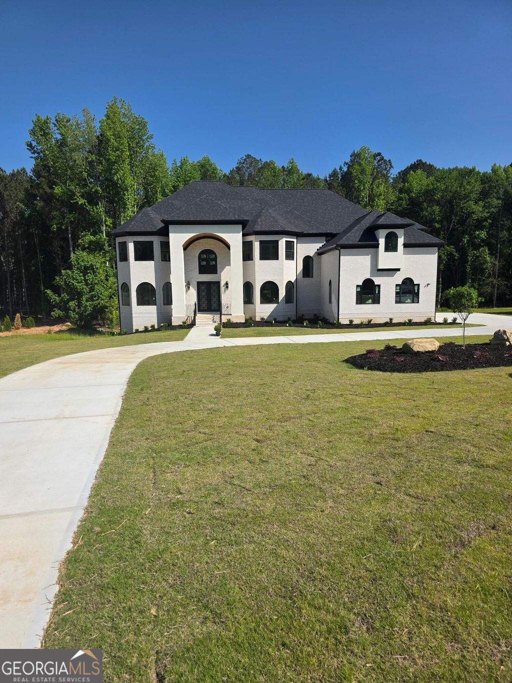 Photo of 210 Waltham Way, Fayetteville, GA 30214 (MLS # 10771155)