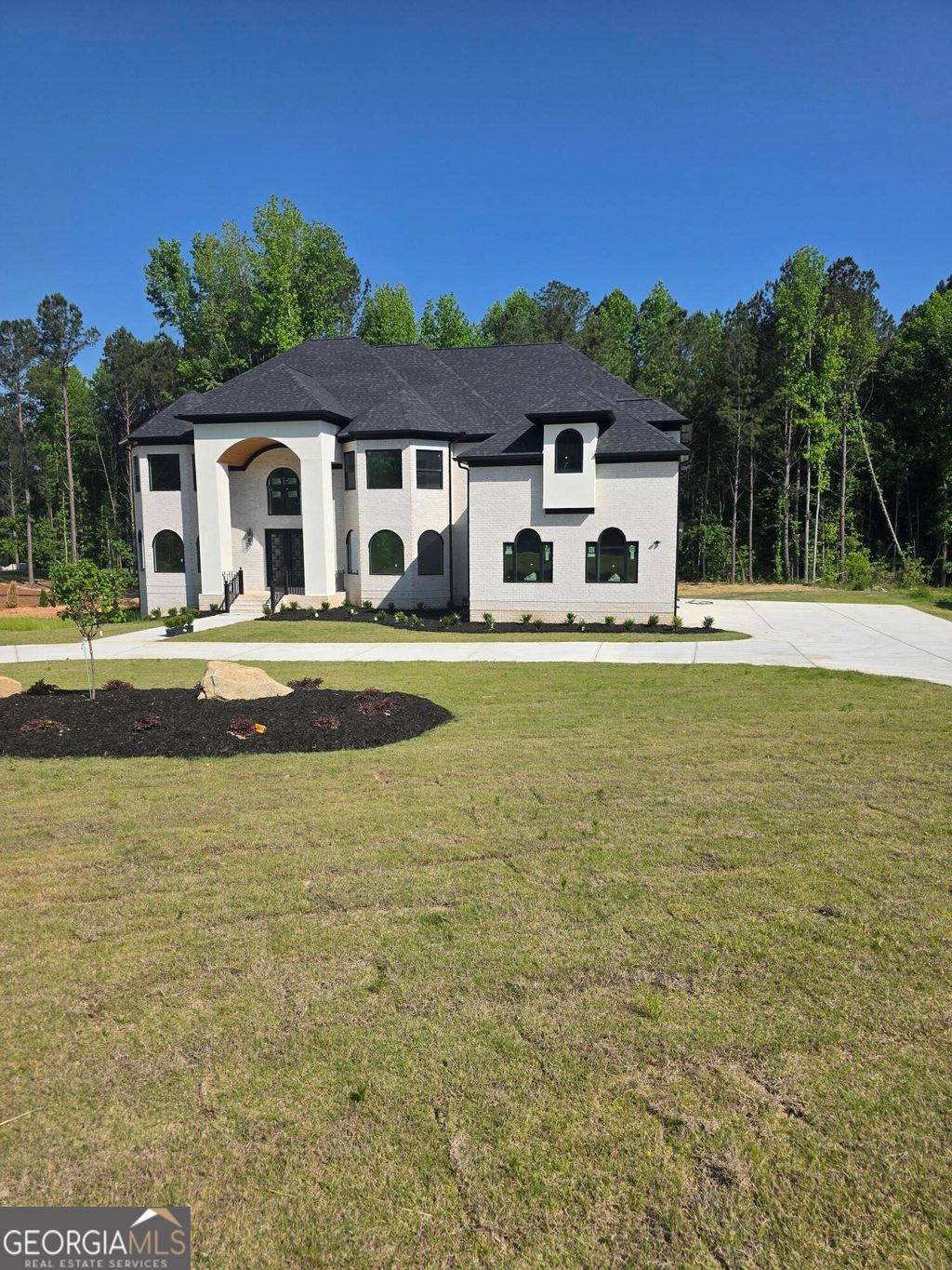 Photo of 210 Waltham Way, Fayetteville, GA 30214 (MLS # 10771155)