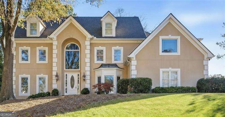 BRAND NEW ROOF, Framed Daylight Basement & Luxurious Details Throughout!  This elegant European-style home, nestled in a quiet cul-de-sac on a desirable corner lot, offers timeless design and modern potential. Featuring a brand new roof and beautiful hardcoat stucco exterior, this home impresses inside and out.  Step inside to find high ceilings, floor-to-ceiling windows, and an open floor plan filled with natural light. The sunken living room with a cozy fireplace and waterfall staircase make a stunning statement, while the chef's kitchen offers custom cabinetry, a built-in pantry, appliance garage, and a bright and airy breakfast area perfect for gatherings.  The main-floor guest suite provides comfort and privacy, and upstairs the spacious primary retreat features a tray ceiling, separate sitting room with fireplace, and a spa-inspired bath. The two additional upstairs bedrooms include an oversized Jack & Jill suite plus a bonus room ideal for a home office or playroom.  The full, unfinished daylight basement, stubbed for a bath and framed for multiple rooms, offers endless possibilities for a game room, home theater, gym, or even an in-law suite. Outside, enjoy a peaceful backyard with patio and BBQ area that is perfect for relaxing or entertaining. The home also features a full irrigation system, ensuring your lawn stays lush and well-maintained year-round.  Blending architectural charm, luxurious finishes, and expansion potential, this home delivers elegance, comfort, and value. Schedule your showing today!