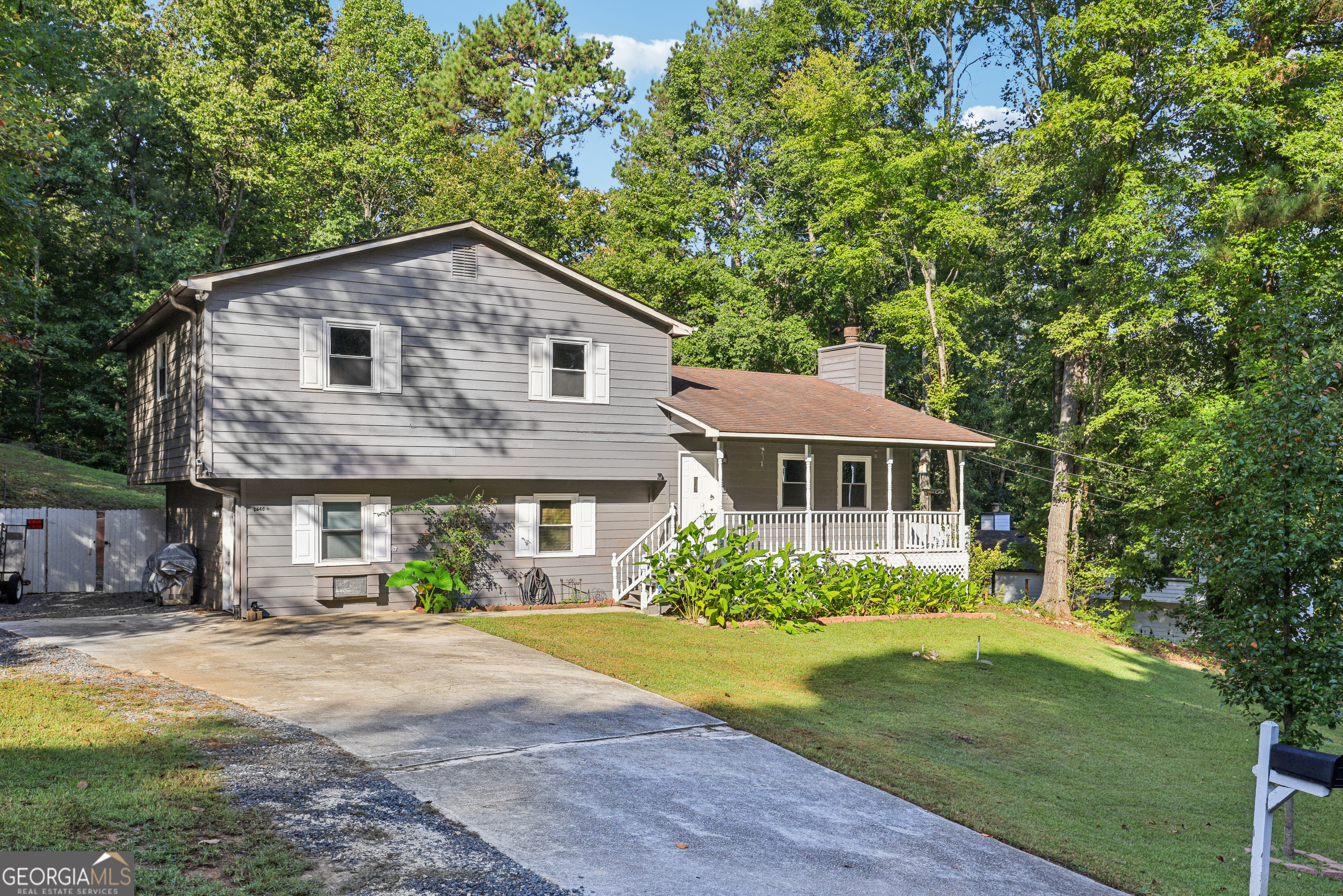 Are you looking for a home that combines spacious living with rental income potential? Welcome to 3640 Silver Leaf Ln SW in Marietta, GA! This inviting 4-bedroom, 3.5-bath split-level home is designed for families seeking comfort and versatility. Picture yourself unwinding on the spacious back deck, where you can enjoy serene evenings overlooking nearly half an acre of lush greenery? ideal for outdoor gatherings and recreational fun. The charming wooden playhouse and convenient storage shed transform your backyard into a private oasis for relaxation and entertainment. Located in a prime area, you'll have easy access to schools, shopping, and the Main Wellstar Hospital, as well as quick connections to I-285 and the East-West Connector. This combination of outdoor space and convenient amenities makes this home a perfect retreat for families and individuals alike. What sets this property apart is the unique attached one-bedroom, one-bath apartment with separate access, offering the perfect solution for multigenerational living or an income-generating rental. Located in a tranquil neighborhood with no HOA, this home offers you the freedom to personalize your space without community restrictions. Don't miss your chance to embrace a lifestyle of comfort, space, and financial opportunity! For more information or to schedule a private showing, reach out today!