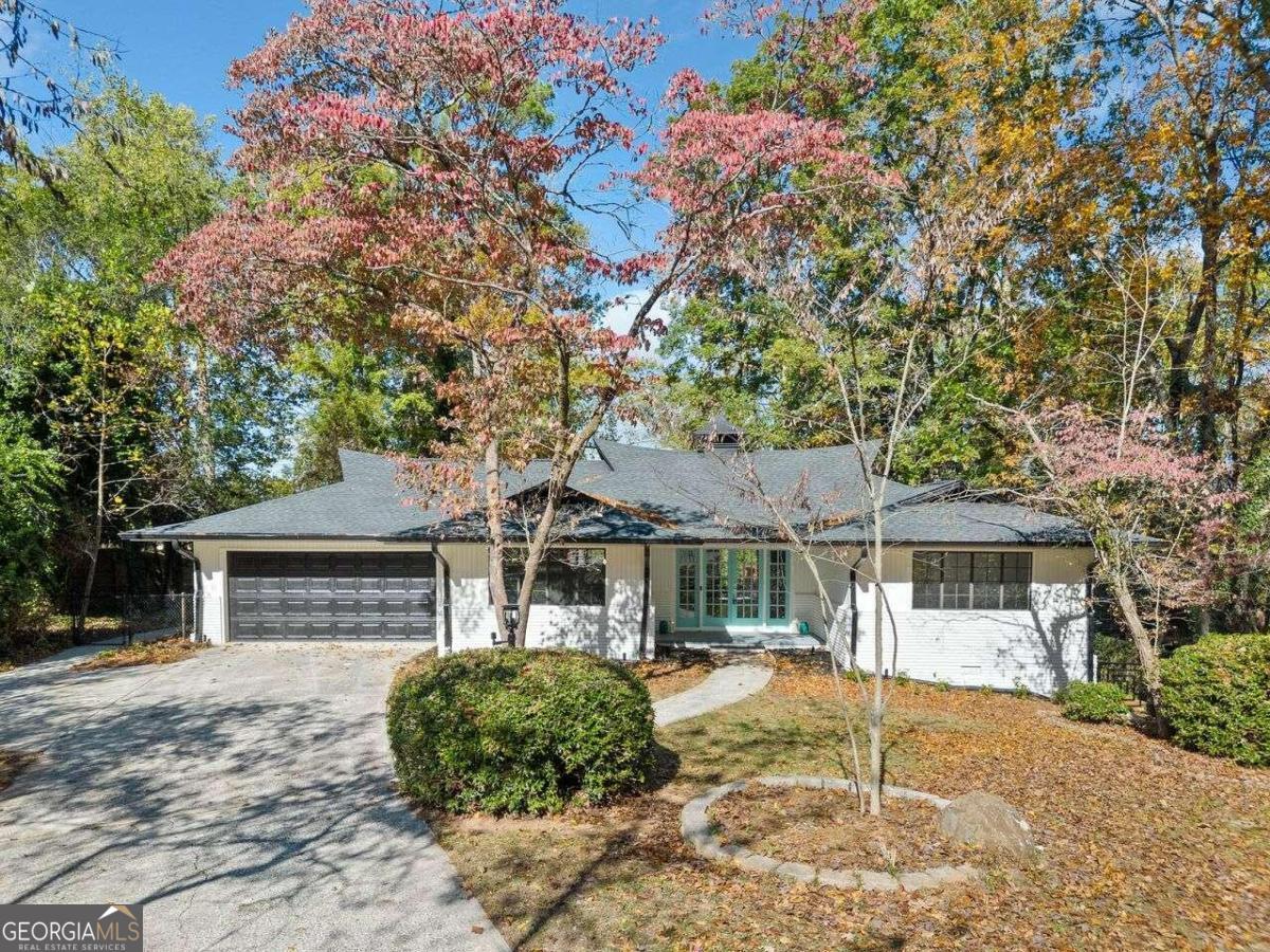 Welcome to your dream home in Marietta! This beautifully remodeled property boasts an open concept design that seamlessly blends modern living with comfort. The heart of the home features a stunning kitchen with a spacious island, perfect for entertaining and family gatherings. Enjoy the luxury of double vanity sinks in the bathrooms, along with fully remodeled showers that provide a spa-like experience. This home is designed for convenience, featuring a dedicated mud room and a functional laundry room to keep your space organized. The generous basement offers ample room for family activities, making it the ideal spot for creating lasting memories. Step outside to a lovely patio/deck, perfect for relaxing or hosting gatherings in your tranquil backyard. Nestled in a quiet neighborhood, this property is conveniently located near groceries and shopping, providing the best of both worldsCoa peaceful retreat with easy access to everyday essentials. DonCOt miss the chance to make this beautifully updated home yours!