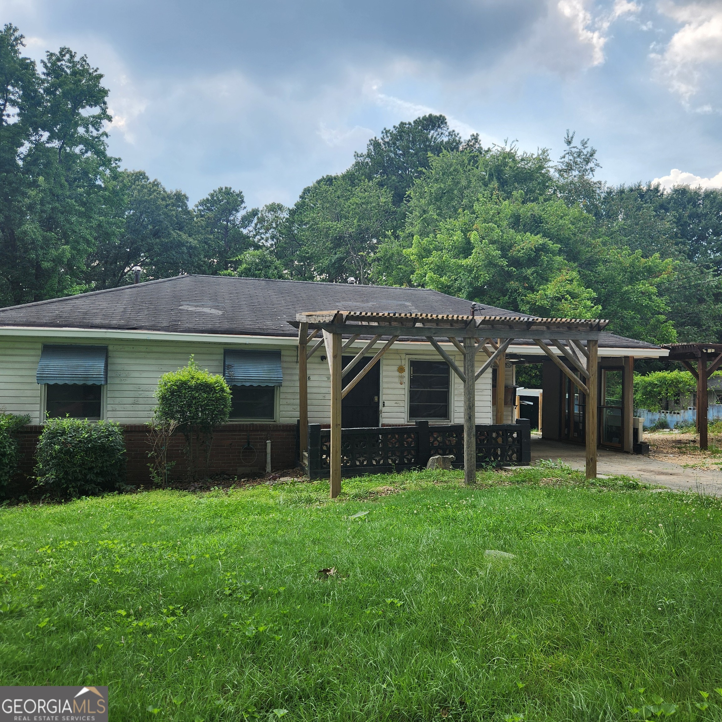INVESTOR SPECIAL-PRIME Fix & Flip or Rehab & Hold. Great investment opportunity in this older home with a perfect canvas to renovate and take advantage of strong ARV potential in HOT 30318 area. Convenient to Public Transportation, inside I-285 with easy access to central downtown business district, major sports venues, Westside Park at Bellwood Quarry, shops restaurants and all that West Midtown has to offer. Spacious corner lot with detached structures. No HOA. Don't miss this opportunity!