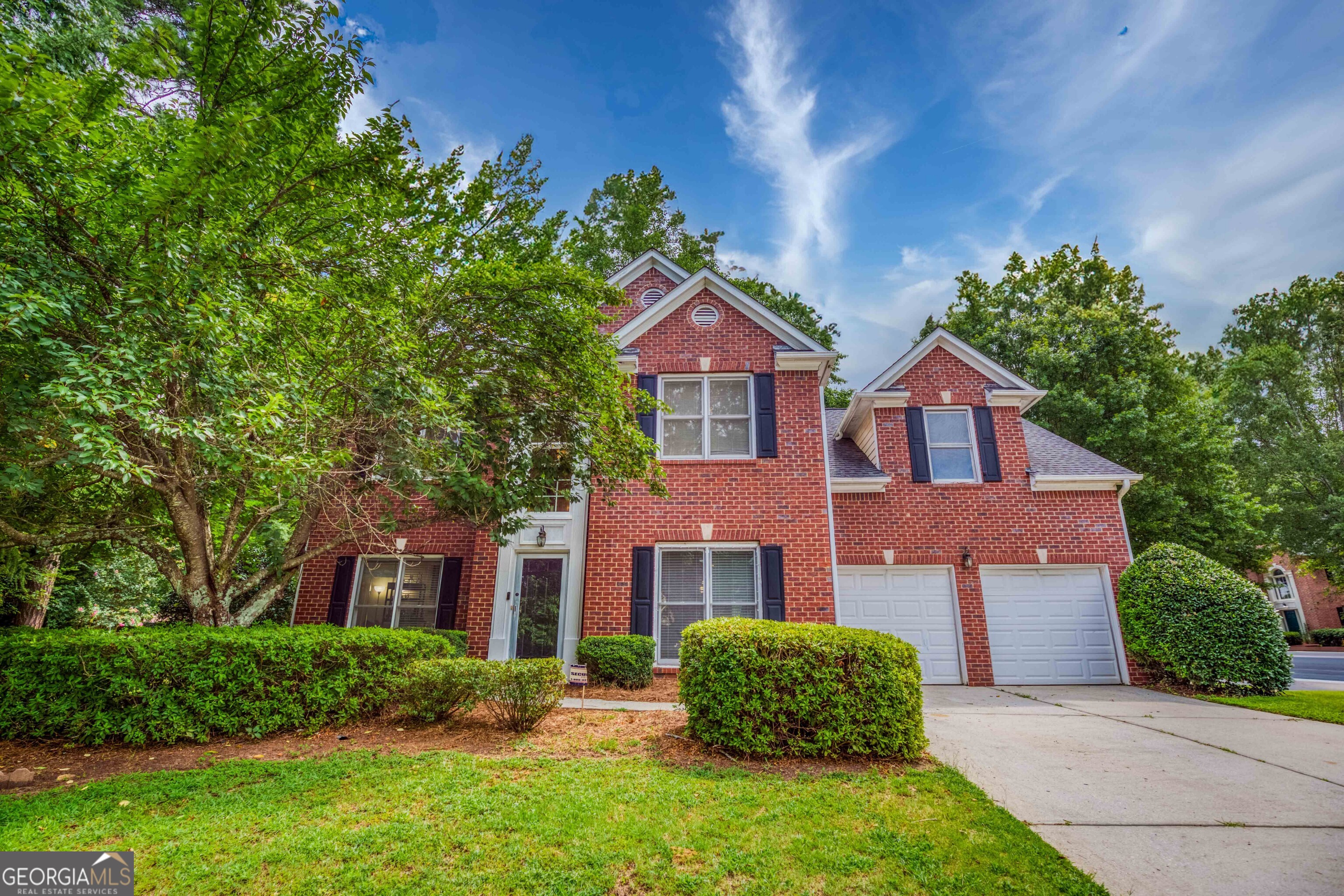 Welcome to this beautifully maintained, move-in ready home nestled in the desirable Huntington Falls community just minutes from scenic Alexander Park and located in the highly sought-after Grayson High School district! From the moment you enter the light-filled two-story foyer, you'll feel right at home. The main level features a formal dining room and a versatile flex space perfect for a home office, playroom, or additional sitting area. The open-concept kitchen flows seamlessly into the spacious family room with fireplace, creating the perfect layout for everyday living and entertaining. Upstairs, you'll find four generously sized bedrooms, a shared full bath, and a convenient upstairs laundry room. The expansive owner's suite is a true retreat with two walk-in closets, a cozy sitting area, and a spa-inspired bath complete with dual vanities, a soaking tub, and a separate shower. Enjoy all the amenities this neighborhood has to offer, including a swimming pool, tennis courts, volleyball, a playground, picnic areas, and peaceful walking trails along the lake. Don't miss this opportunity to own a well-cared-for home in one of Lawrenceville's most welcoming and conveniently located communities!