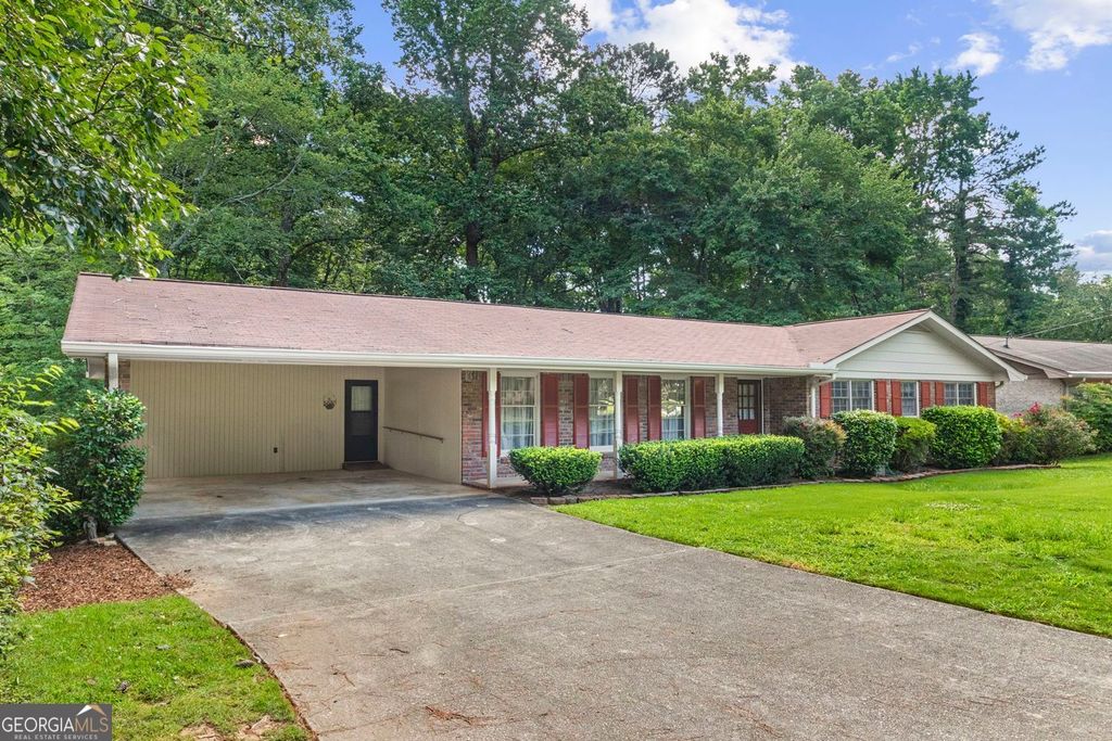 Photo of 708 Rollingwood Drive, Stone Mountain, GA 30087 (MLS # 10795192)