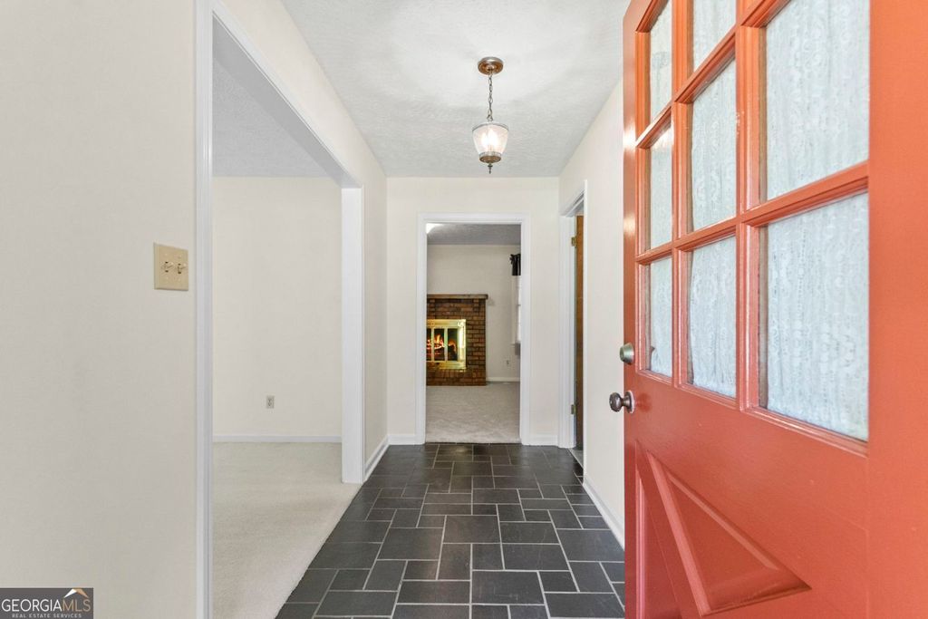 Photo of 708 Rollingwood Drive, Stone Mountain, GA 30087 (MLS # 10795192)
