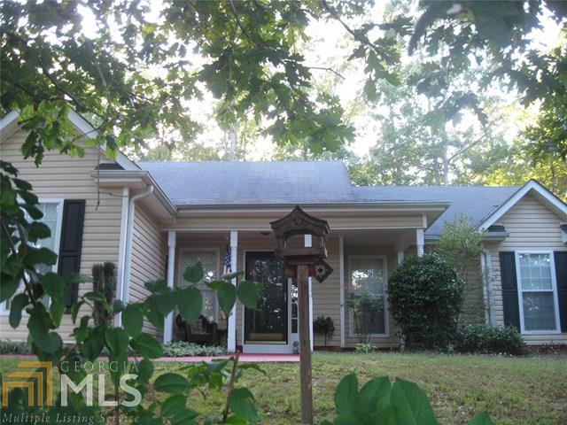 Lovely ranch home on 2 private acres. Home features family room w/fireplace, split bedroom plan, country kitchen w/breakfast bar, master suite with walk in closets , double vanities and more. Backyard features privacy, beautiful oak, dogwood trees and plants abundance. Great backyard for kids with trails for bike riding and more! Must see this one on the inside and outside. Great deal for the first time homebuyer in a great quiet neighborhood close to the interstate, shopping and schools! This home is move in ready! Motivated seller makes this home a must show!