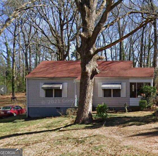 Charming East Lake Opportunity - Investor Special! 2 bedroom, 1 bathroom home located in the heart of East Lake, just minutes from the prestigious East Lake Golf Course. This property is a prime opportunity for investors or builders-perfect for a full renovation or a tear-down and rebuild project on a leveled 0.300-acre lot. Sold As-Is. Cash or hard money offers preferred. Don't miss your chance to invest in one of Atlanta's most desirable and rapidly growing neighborhoods. Bring all reasonable offers!