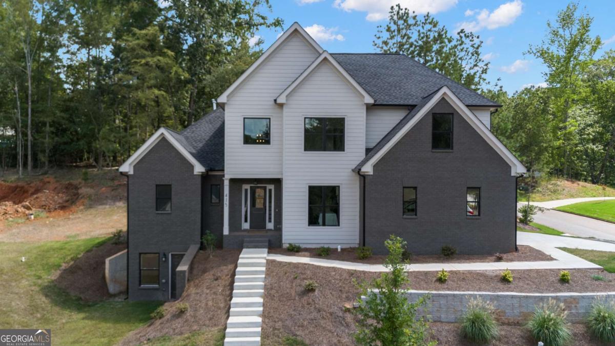 Welcome to your new home in beautiful Athens, GA home of the Georgia Bulldogs! River Ridge is a new community with nature trails adjacent to the Oconee River Greenway. River Ridge is close to UGA, the Vet School, downtown Athens & Wire Park-Watkinsville, our newest eatery & gathering venue. This convenient location features QUALITY custom homes by Stephens Communities, a 50+ year experienced builder who is onsite and available. Built with quality & expertise you will find a luxury home at an affordable price. Designer built floor plans with easy flow of living and entertaining you will be impressed as you walk through the doors of your new home. Featuring hardwood floors, gourmet kitchens, quartz upgraded countertops, tile bathrooms, soaking tubs & vaulted or two story ceilings. These energy efficient homes were built with spray foam insulation, low e windows, Trane HVAC, and prewired for SMART HOME ability. This home is the Crestwood with Master Suite on the main floor, 3 large bedrooms upstairs & a keeping room & living room with a formal dining room & gourmet kitchen on the main floor plus a large breakfast area for a large farmhouse table. Electric Charger in Garage. This home also has a walk out daylight basement. Call now for a tour. Agents onsite. Call now for a tour. Agents also onsite most days.