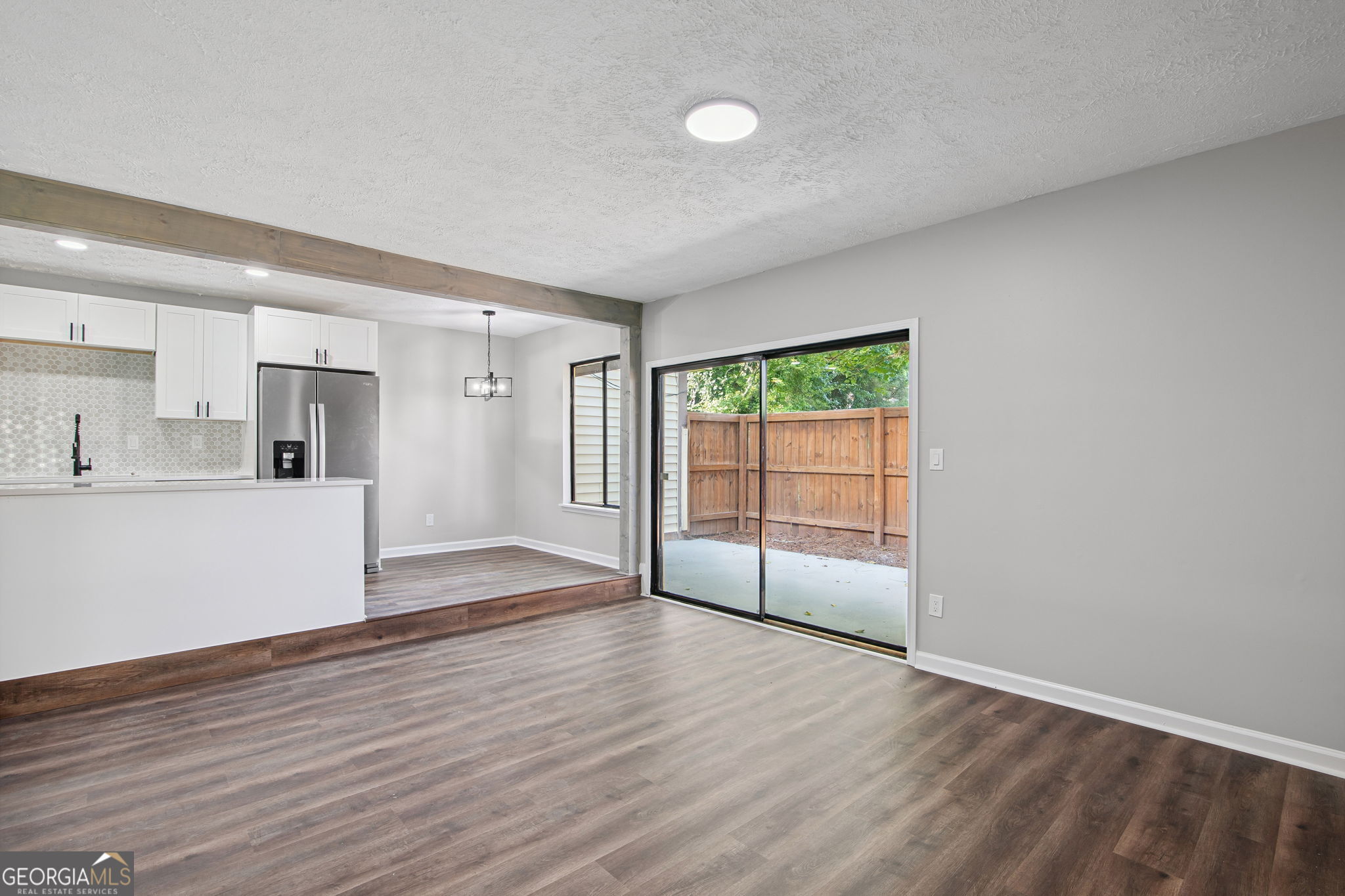 Welcome to this fully renovated 2-bedroom, 2-bath end-unit townhome in the heart of Decatur! Offering nearly 1,000 sq. ft. of stylish living space, this move-in ready home features brand-new luxury vinyl plank flooring throughout, an open-concept kitchen with an oversized island, and beautifully updated bathrooms. Every major system has been replaced, including the HVAC, water heater, appliances, and more, providing comfort and peace of mind. Enjoy the privacy of a fenced backyard, two assigned covered parking spaces, and the convenience of a bus stop right outside your door. With easy access to major highways, plus Kroger, Publix, schools, gyms, and shopping nearby, this home offers both modern living and everyday convenience. Rent is $1,595 per month and Section 8 is welcome.