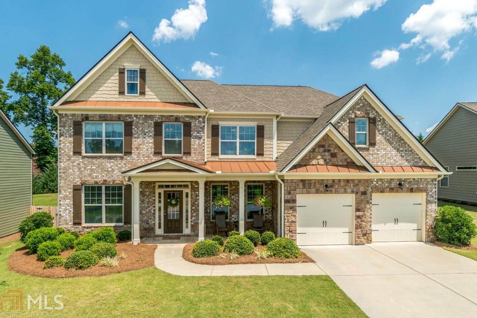 Beautiful craftsman style, open concept floor plan, custom renovated home for outdoor entertaining with an amazing must see outdoor covered patio and stacked stone fireplace. Enjoy the coffered ceilings, wrought iron railing, hardwood floors and plantation blinds in the family room that adorns a second stack stone fireplace between two elegant built-in shelves. The family room opens directly into a Gourmet Kitchen with all stainless steel appliances, granite counters, subway tile backsplash, and gorgeous white cabinets. The grand entrance foyer leads to a spacious dining room, library, and family room. Guest suite with full bath on main. Discover the upstairs expansive master retreat w/sitting area, double granite vanity, separate soaker tub and shower.