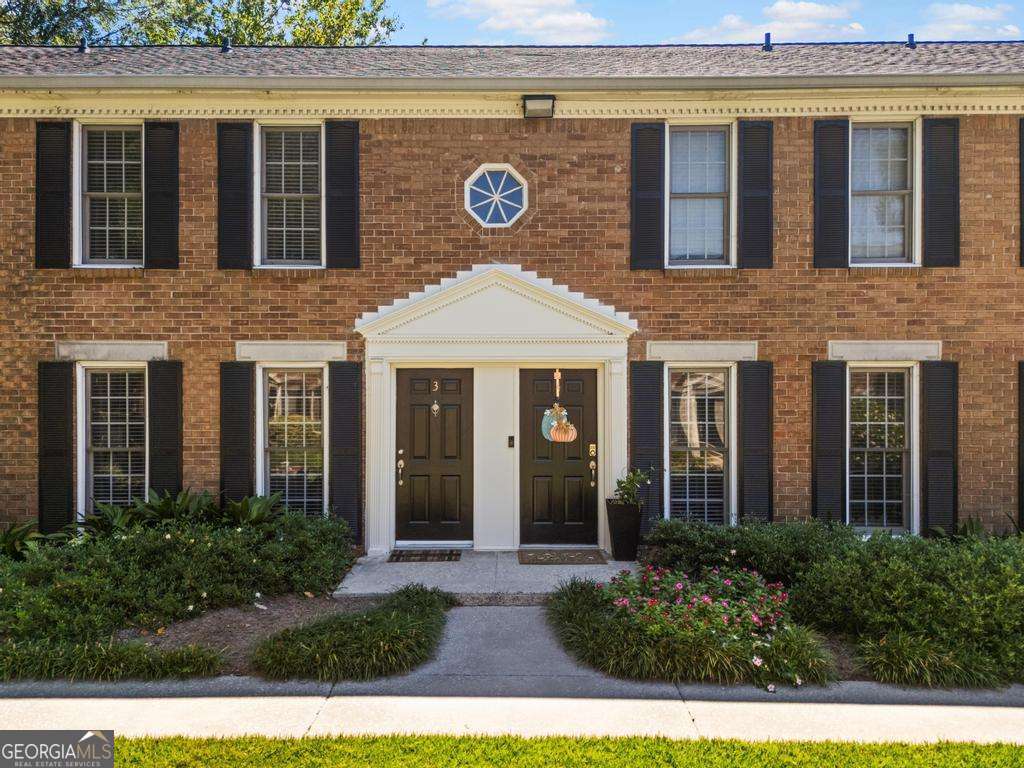 Discover urban convenience in this two-story brick townhouse nestled within a secure gated community in Atlanta. With effortless access to Interstate I-75, you'll be just minutes from the city's vibrant heart, yet tucked away in a peaceful enclave featuring an on-site pool and fitness center. Step inside to a spacious, light-filled living room that welcomes you with an abundance of natural light, perfect for entertaining. The first floor also boasts a convenient half bathroom and an eat in kitchen. Recently renovated, the kitchen shines with sleek stone countertops, stainless appliances, and ample cabinetry-making meal prep a joy while overlooking the casual dining area. Head upstairs to two bedrooms, each offering plenty of closet space. The renovated master bathroom impresses with a new vanity and tile work. Throughout, high-end vinyl flooring adds a touch of sophistication and durability, while the fenced back patio provides a private outdoor oasis for al fresco dining, gardening and relaxing outdoor privacy. And with plenty of parking right at your doorstep, this townhouse combines low-maintenance living with unbeatable location perks. Whether you're commuting to Midtown, strolling through Buckhead, or dining in Virginia-Highland, everything Atlanta has to offer is at your fingertips within a short drive.