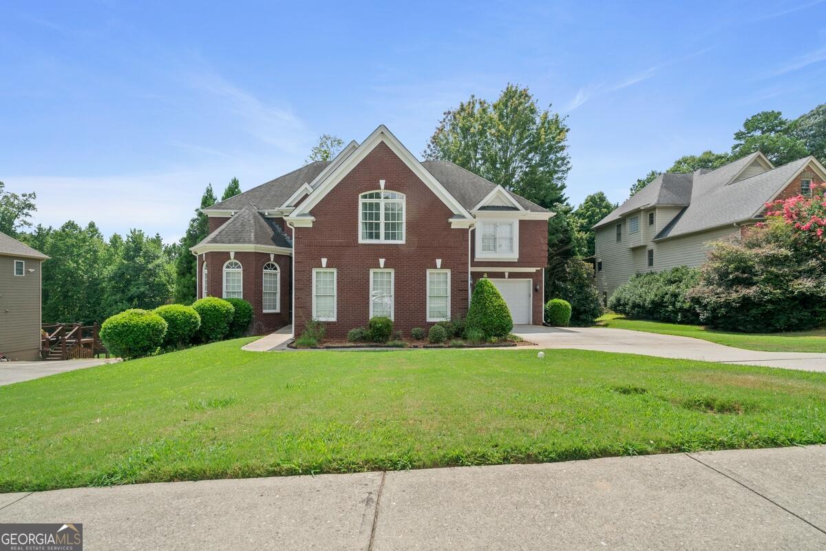 This beautiful 2-story home at 2080 Misty Oaks Dr, Buford, GA 30519 offers 6 bedrooms and 5.5 bathrooms, providing an abundance of space for comfortable living. The property features a full finished basement, a spacious kitchen equipped with stainless steel appliances, and a total of 4 fireplaces throughout the home for added warmth and charm. It is serviced by 2 HVAC systems for efficient climate control and includes a 2-car attached garage. Outside, enjoy a large backyard with a raised wooden deck perfect for entertaining or relaxing. Located in a desirable Buford neighborhood with an HOA of only $63 per month, this home is conveniently situated near top-rated schools, shopping centers, dining, and major highways for easy commuting