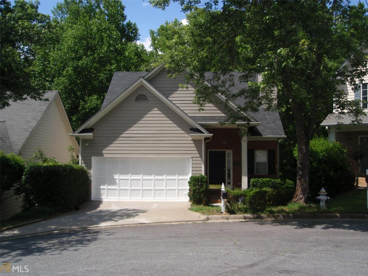 Run, don't walk to this adorable and affordable ranch style house on full finished basement in Alpharetta! Open and bright floor plan! New interior paint. All hardwoods on main level and commercial grade laminate in basement. Vaulted family room with fireplace. Separate formal dining room. Kitchen with breakfast area. Master suite on main level. Basement has additional living room, two bedrooms, full bathroom and large unfinished area. Small community close to everything in great North Fulton school district. Private wooded backyard.