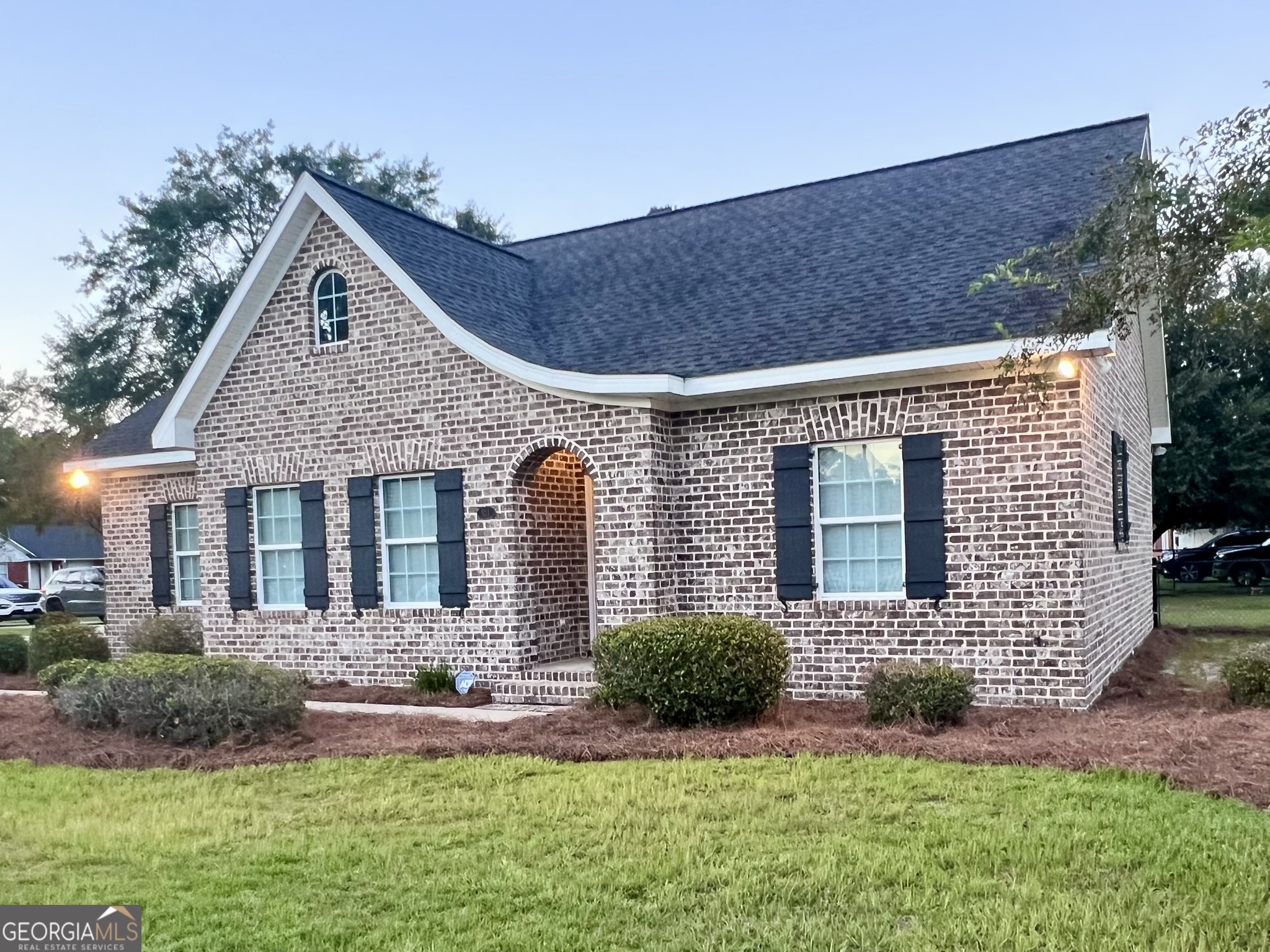 Beautiful, brick home conveniently located in town and only 1 block from the city park and recreation center! Built in 2015, this adorable 3 bedroom, 2 bath home was strategically laid out to maximize the square footage to its fullest potential. The desirable 0.46 acre corner lot gives plenty of yard space and the fenced back yard and patio make it perfect for children and pets! With an open concept living space, the fireplace is the focal point and the stainless appliances give a sleek look as well! This one is a must see!
