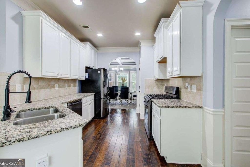 Photo of 7933 Heathmore Drive, Fairburn, GA 30213 (MLS # 10682015)