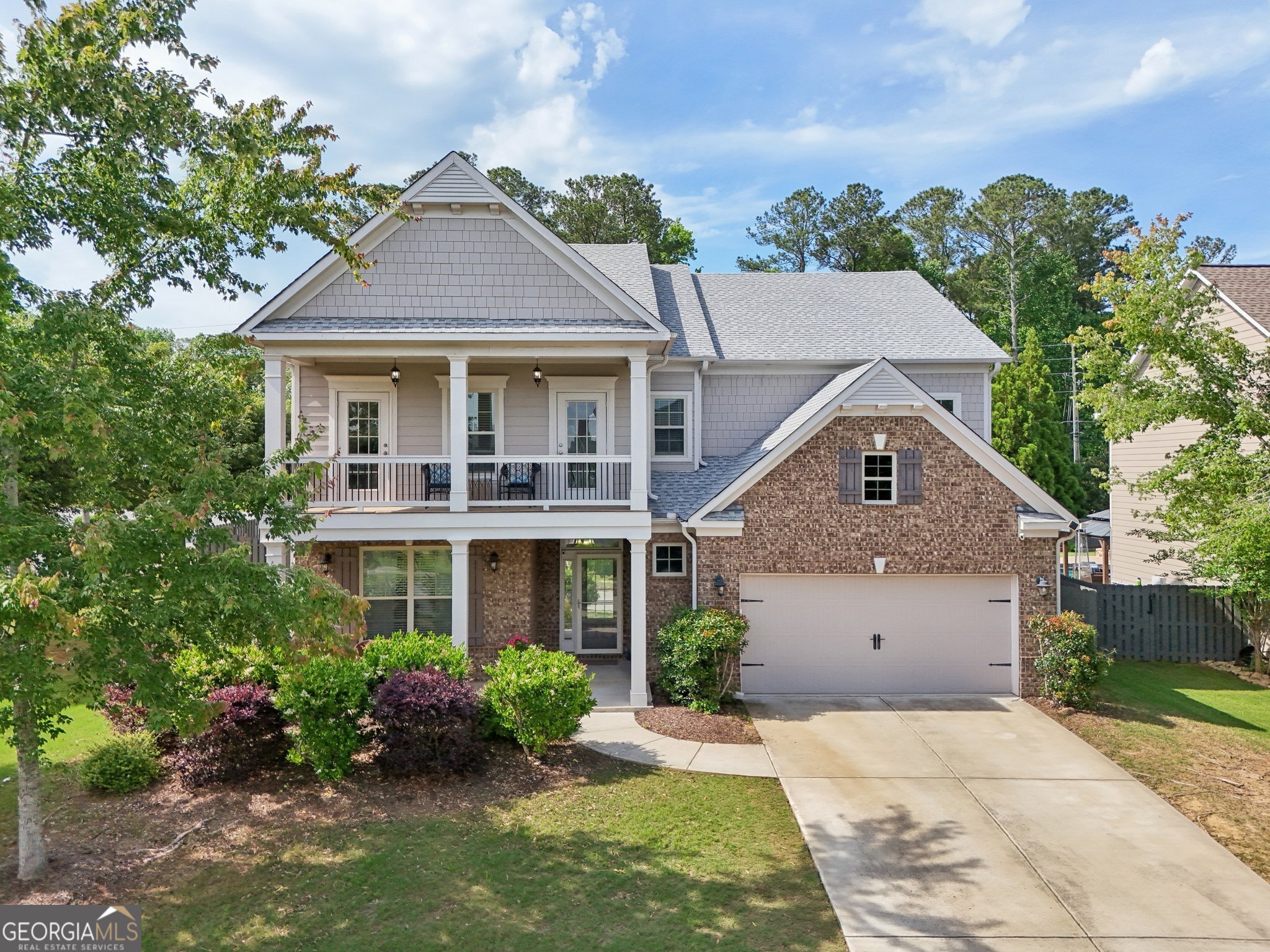 Spacious 4BR/3.5BA Home Minutes to Lake Allatoona! Welcome to your dream home in the sought-after Park at Steels Bridge! This nearly spacious gem offers the perfect blend of style, function, and location-just minutes from Little River Marina and beautiful Lake Allatoona. Enjoy classic Southern charm with double front porches, ideal for relaxing evenings or morning coffee. Inside, you'll find brand new LVP flooring and carpet throughout, setting the stage for a fresh and modern feel. Roof only 5 years old! * This thoughtfully designed home features: 4 Bedrooms / 3.5 Bathrooms * Office on the main level + spacious loft upstairs * Energy-efficient closed cell spray foam insulation in the attic-keeps upstairs & attic temps consistent and reduces energy bills! * Tankless water heater! * Chef's kitchen with granite countertops, center island, gas cooktop, double ovens, microwave, dishwasher & adjoining keeping room * Mudroom off the garage plus dining area * Fireside family room with coffered ceiling * Huge fenced backyard with room for a pool, playground, or garden oasis * Upstairs, the oversized primary suite includes a trey ceiling, spa-like bathroom with double vanity, separate tub and shower, and a walk-in closet with direct access to the laundry room. One secondary bedroom boasts a private en-suite bath and direct balcony access-perfect for guests or teens. * Don't miss this beautifully upgraded home with space to spread out, entertain, and enjoy everything this vibrant community (with Neighborhood Swim/Tennis/Basketball and Playground) and nearby Lake Allatoona have to offer. Only 1.7 Miles to Little River Marina and home to the Blue Cat Lodge from the Netflix series Ozark - known as J.D.'s on the Lake! Possible Loan Assumption at 3.26%! Schedule your private tour today!