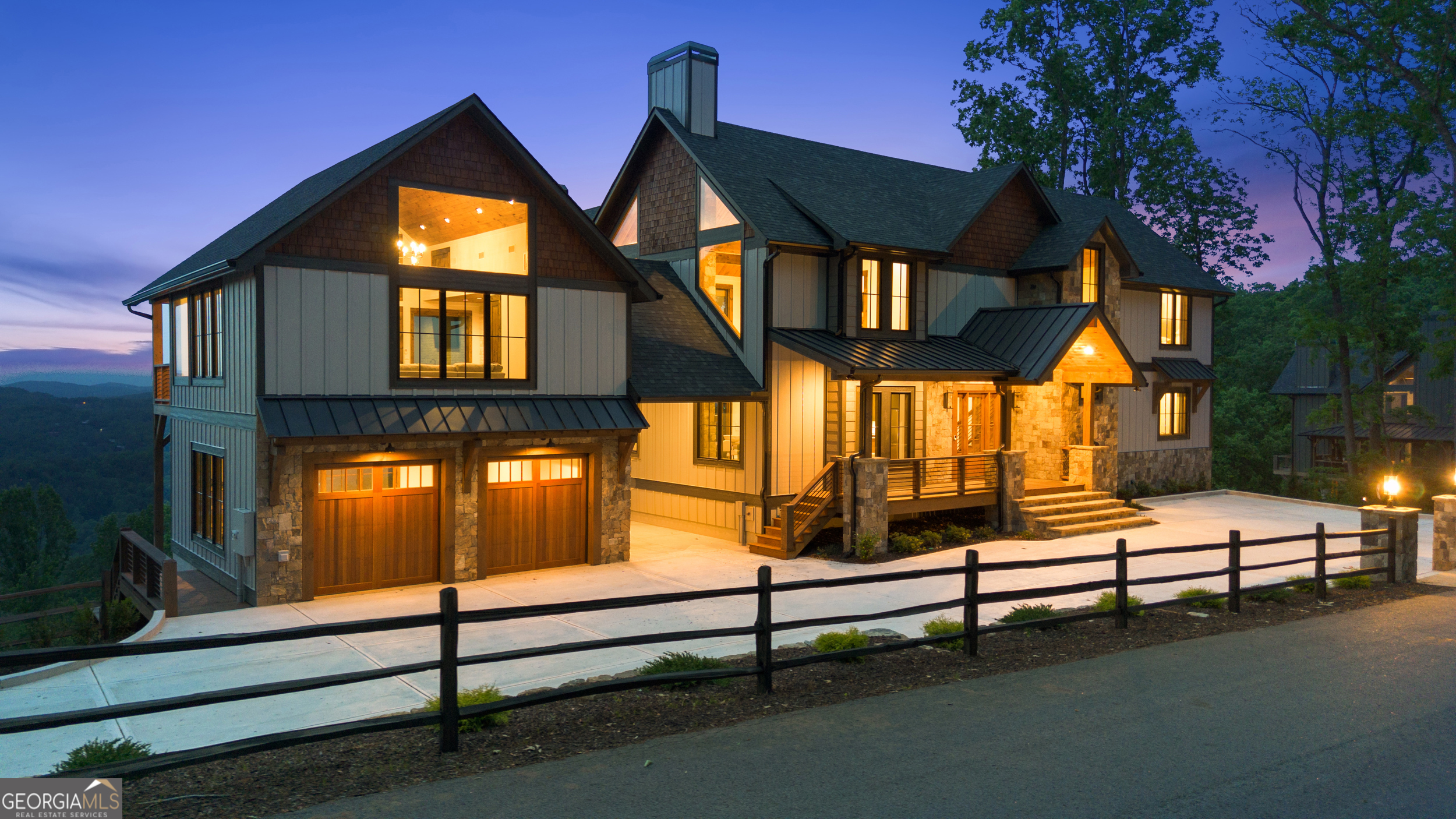 The "GRAND SUMMIT " is perched atop the ridgeline of Blue Ridge Heights. This home is a masterpiece that stands out both in appearance and atmosphere. As you walk through the property, you'll feel the tranquility, craftsmanship, and confidence in every detail. Imagine yourself living in a place like this. This is not just another new build; it's a mountain estate crafted by Ruiz Construction, known for transforming bold visions into homes for generations. Every detail has a story: The Ruiz inspired property offers custom-etched hardwood floors with a unique stain, walls painted in hand curated colors, and furnishing touches by Southern Sky to complete the spaces. Soundproofing ensures peace throughout, included in every bedroom and the private movie room. Bathrooms offer comfort with motion-lit under-cabinet lighting. The kitchen is a blend of beauty and functionality, featuring Thermador and Thor appliances, Taj Mahal quartzite, and custom cabinetry designed for hosting and entertaining. Each bedroom has a private en-suite, providing luxury and personal space. The upper level includes three guest suites and a four-bed bunk room in the loft. The lower level offers a game room, private theater, and easy access to outdoor living areas. Above the garage, there's a fully independent guest suite with a full bathroom for ultimate flexibility. Whether you're looking for a primary residence, luxury getaway, or high-end rental investment, this home exceeds expectations on every level. Property is being sold Fully furnished turnkey. Just minutes from downtown Blue Ridge, this property delivers access, elegance, and elevation, ready to welcome you in any season of life. All information provided is believed to be accurate but is not warranted or guaranteed. Buyer and buyer's agent to independently verify all details, including square footage, schools, utilities, and restrictions.
