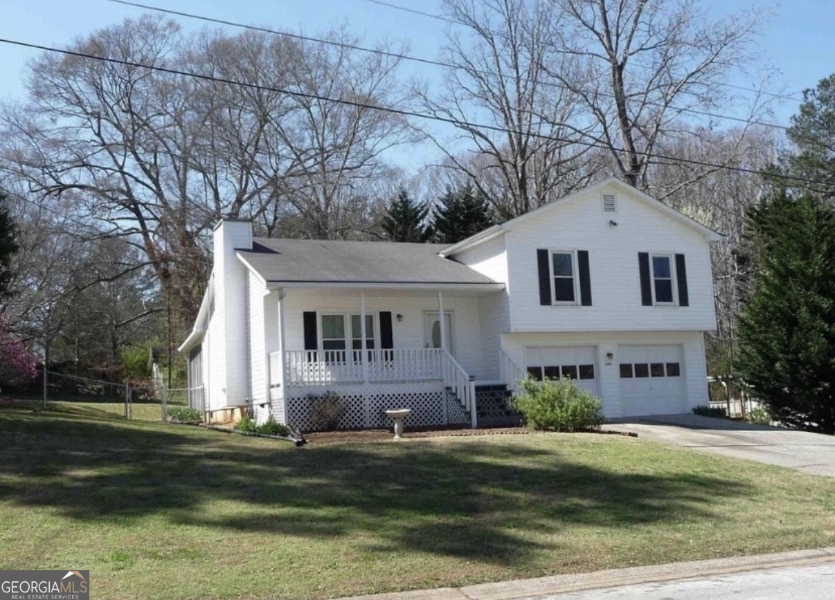 Price UNDER APPRAISED value, instant EQUITY for the buyer! FANTASTIC CHANCE TO GRAB THIS HOME AT AN UNBEATABLE PRICE!!! Beautiful 4-Bedroom Home in a Great School District! Welcome to this spacious Loganville home with NO HOA. Featuring 4 bedrooms and 2 bathrooms. Step inside to a bright, open living room with a cozy fireplace and a separate dining area. The main level flows into a cute kitchen, while upstairs you'll find three generously sized bedrooms and two full bathrooms. The lower level offers an additional bedroom and a convenient laundry area. Outside, enjoy a huge, level backyard with plenty of space, a nice storage shed, and a small screened porch-perfect for relaxing or entertaining. Major updates include a 4-year-old water heater and a roof approximately 6 years old, giving you peace of mind for years to come. This home is BEING SOLD AS-IS, ready for your personal touch and updates to make it truly yours! Buyers are welcome to do their own inspection. PREFERRED CLOSING ATTORNEY McMichael & Gray PC IN LAWRENCEVILLE OFFICE.