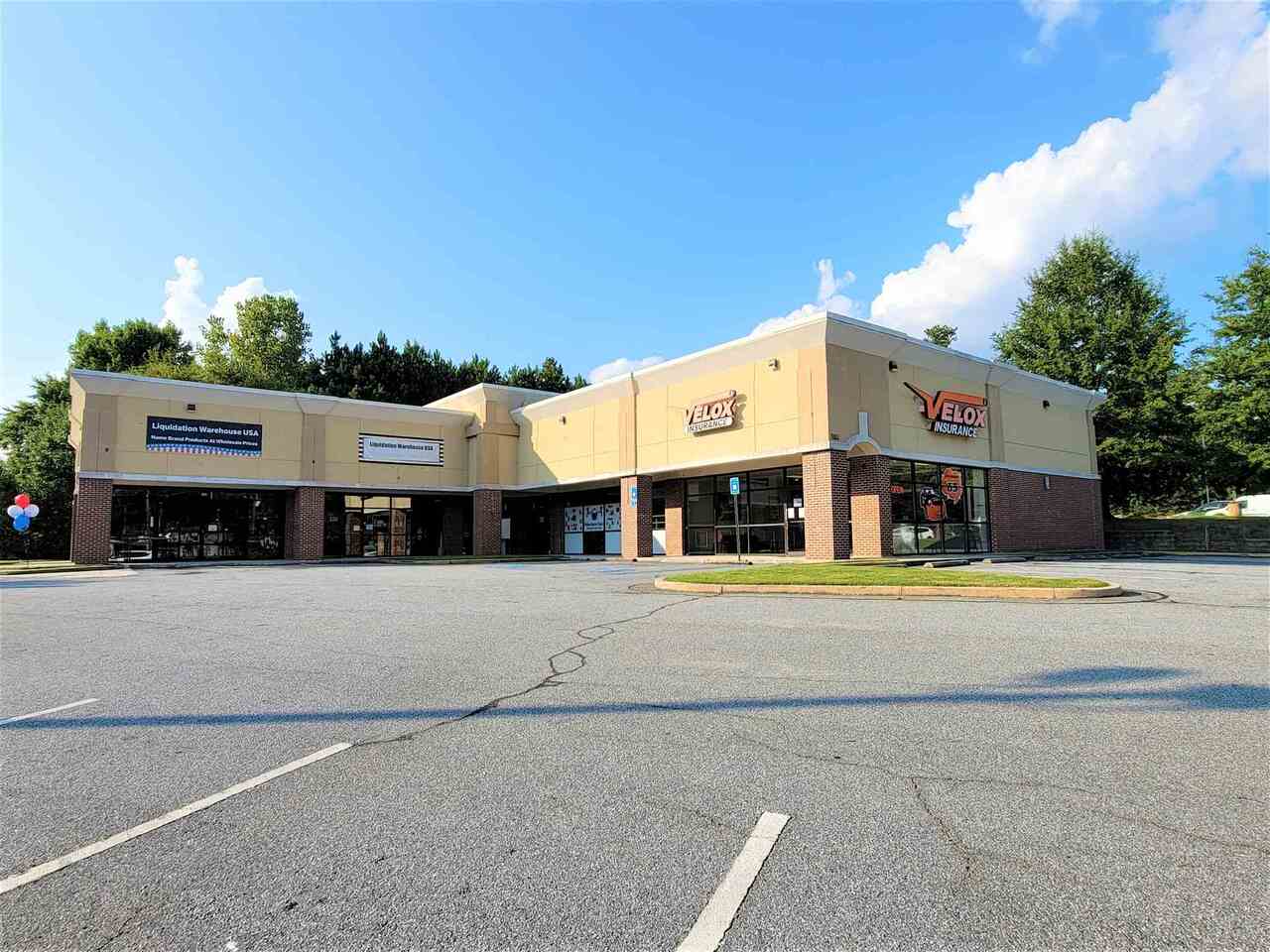 Excellent income-producing investment property! 6 unit retail commercial building, a wide mix of stable tenants. Excellent location off of State Highway I-85 between Buford Hwy and Langford Rd. Business Center. Great visibility from the street. Asphalt paved parking. Public water & sewer.