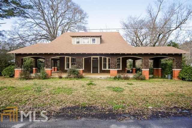 Elegant Historical home located in Downtown Concord, built in 1914. This house features high ceilings & original thick crown molding along with original hardwoods in parts of the home, 6 decorative fireplaces & 1 wood burning stove. The home has been moderately renovated new roof, new central HVAC system, new roof & new electrical. Upstairs stubbed for full bath & additional room with many possibilities.