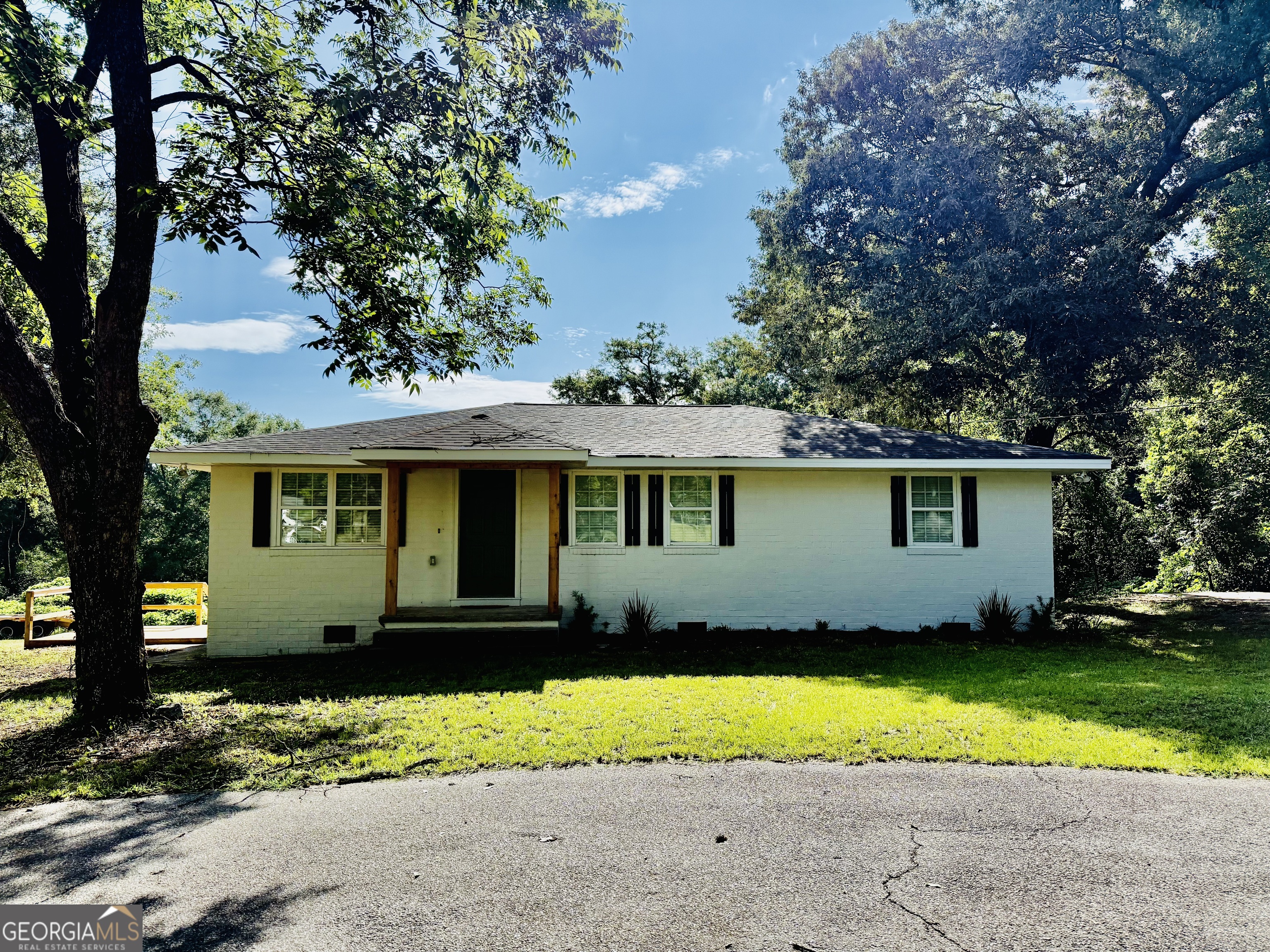 Almost Everything is New-and on 1.52 Acres in Centerville! Welcome home to this beautifully reimagined all-brick gem, completely remodeled from the studs out and move-in ready! Nestled on a generous 1.52-acre lot sprinkled with mature pecan and pear trees, this 3-bedroom, 2-bathroom home offers the perfect blend of modern upgrades and peaceful outdoor living. The home offers an airy, open feel with fresh paint inside and out, stunning new engineered hardwood flooring, and elegant tile in the bathrooms. No detail was overlooked-new electrical, new plumbing, new HVAC, and stylish lighting throughout elevate the entire space. The kitchen is truly the heart of the home, featuring custom-built cabinetry, granite countertops, a deep stainless steel sink, and brand-new stainless steel appliances. The primary suite is a private retreat with a gorgeous tiled walk-in shower. A brand-new washer/dryer combo is also included for added convenience. Don't miss the versatile walk-out basement with electricity-ideal for a workshop, home gym, or additional storage. A circular driveway enhances curb appeal and makes coming and going a breeze. Every inch of this home has been thoughtfully updated for both comfort and style. It's a rare opportunity to enjoy nearly new construction on acreage in the heart of Centerville!