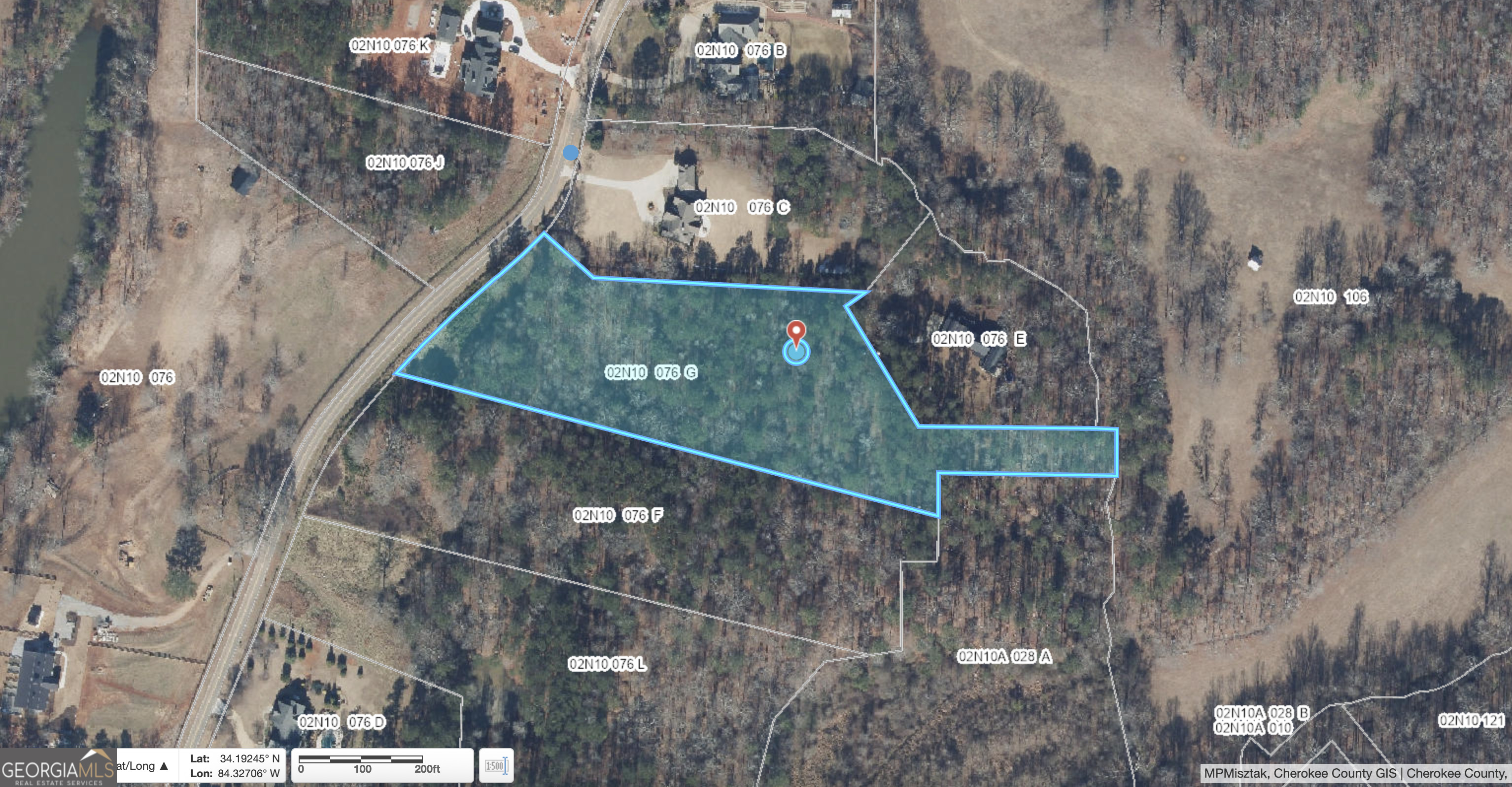 Discover a rare opportunity in Alpharetta: 5.29 acres of prime vacant land. This private, gently rolling tract offers exceptional potential for a custom estate, private family compound, hobby farm, or small development (subject to local approvals). Mature trees create natural privacy and picturesque building sites - imagine a long drive up to a private residence with room for outbuildings, pasture, pool and outdoor entertaining areas. Conveniently located within minutes of Alpharetta's boutiques, dining, and parks, yet offering country-like seclusion, this parcel provides the best of both worlds. Buyers should verify zoning, allowable uses, access easements, utility availability and any required permits with Fulton County/Alpharetta planning and the utility providers. Full set of plans available for a 9,500-10,000 sqft house by Roger Caldwell. Don't miss one of the last sizable tracts available inside the 30004 area.