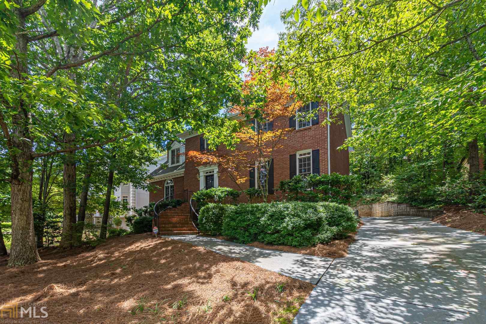 Glorious one owner brick house in highly sought after Studdiford swim, tennis and playground community. Main floor features a great entry that flows into the heart of the homes updated kitchen which is nestled next to the casual eat-in dining perfect for everyday gatherings. Enjoy the fireside Family Room with breathtaking Palladian window that overlooks a private, tree lined lush view. There are many special touches in this home and you will also discover the fancy Formal Living Room, Dining Room, Powder Bath, Hardwoods, Laundry and bright Sunroom with wall of windows.Upper level has a master suite with walk-in closets, newly freshened bathroom, double vanity, separate shower from soaking tub and with the three additional bedrooms along with shared big bathroom upstairs it makes all the space perfect for growing families or visits from friends. The finished basement with full bathroom is ready for entertaining, play or multi-generational living. This home is move-in ready with no detail spared and is waiting for you to call this your own. Easy Access to work, play and live lifestyle! Just minutes to 400, Avalon, Northpoint Mall, Verizon Amphitheater, Big Creek Greenway, Dining, Fitness and award winning schools!