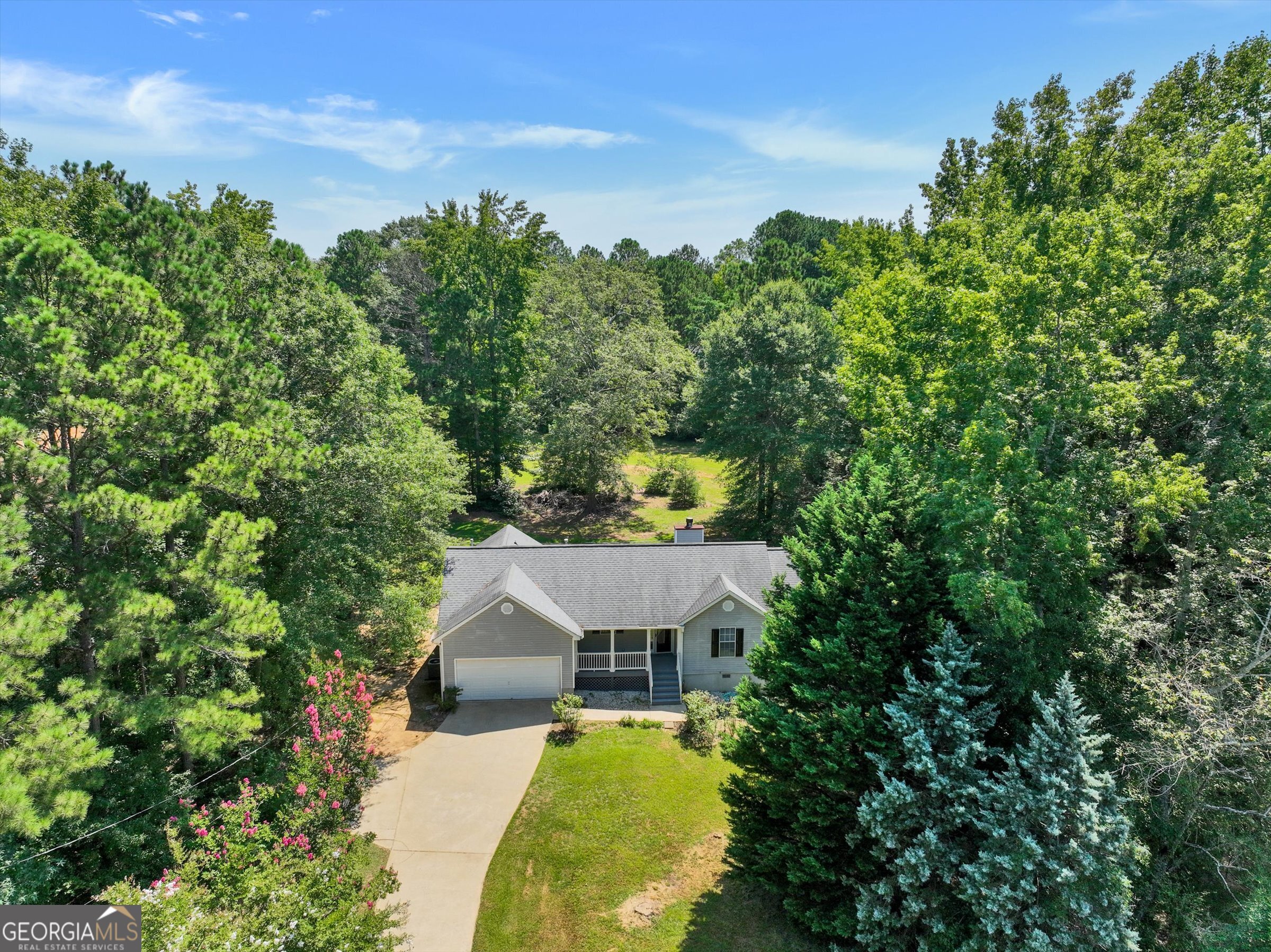 Seeking the charm of country living with convenient access to stores and supermarkets? Discover this stunning, renovated home featuring 3 bedrooms and 2 full bathrooms. View the photos and fall in love with the elegant white cabinets and countertops throughout. Enjoy new flooring and a fresh coat of light paint. Nestled on 1.1 acres in the Duncan subdivision, this property comes with no HOA fees and is owned by a Real Estate Agent.