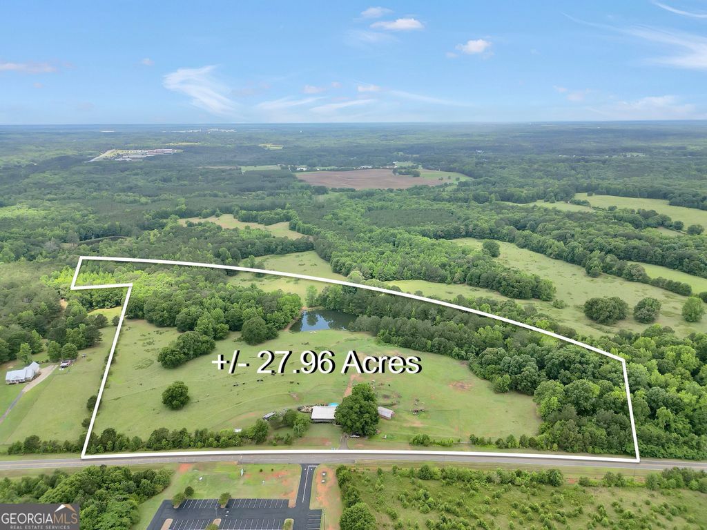Photo of 876 Simpson Mill Road, Locust Grove, GA 30248 (MLS # 10772718)