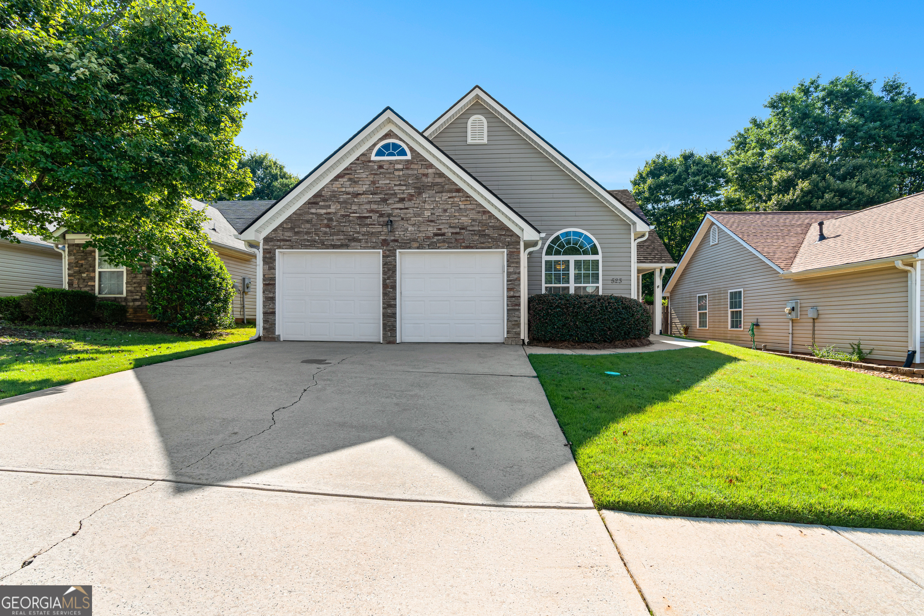 Welcome to this charming 3-bedroom, 2-bath ranch in highly sought-after SummerGrove! Just 5 minutes from Newnan's best dining and shopping, this move-in ready home offers both comfort and convenience. Step inside to a spacious living room with vaulted ceilings and a cozy stone fireplace. The owner's suite features a walk-in closet and double vanities, providing plenty of space and functionality. Recent updates include a brand new HVAC (2024) and a newer roof (2022) for peace of mind. Enjoy outdoor living in the fenced backyard, perfect for pets, play, or gardening. An attached 2-car garage adds extra storage and convenience. With its inviting layout and so much potential to make it your own, this home is a fantastic opportunity in one of Newnan's premier communities.