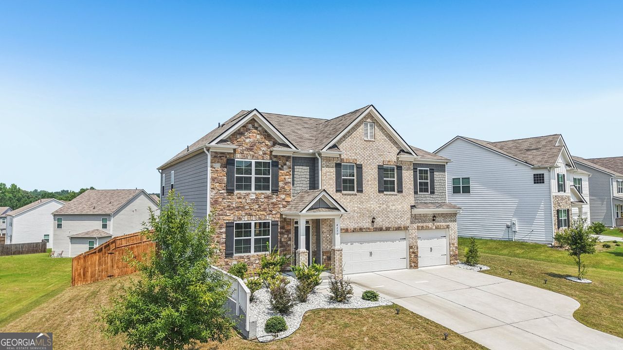 This stunning, move-in ready home is located in one of Fairburn's premier swim & tennis communities, just 15 minutes from Atlanta's Hartsfield-Jackson Airport and close to upscale dining, shopping, and major attractions. This spacious and beautifully maintained home offers over 3,400 square feet of thoughtfully designed living space. Freshly painted and featuring professionally cleaned carpets, it's completely move-in ready. The open-concept layout is ideal for both entertaining and everyday living, anchored by a gourmet kitchen with abundant cabinetry and premium finishes. A formal dining room-or flexible space-adds versatility to the main floor, which also includes a private guest suite with a full bath. Upstairs, you'll find generous bedrooms, well-appointed bathrooms, and plenty of room to grow. The three-car garage offers ample storage, and the fenced backyard provides the perfect setting for outdoor relaxation and fun. Schedule your private tour today!