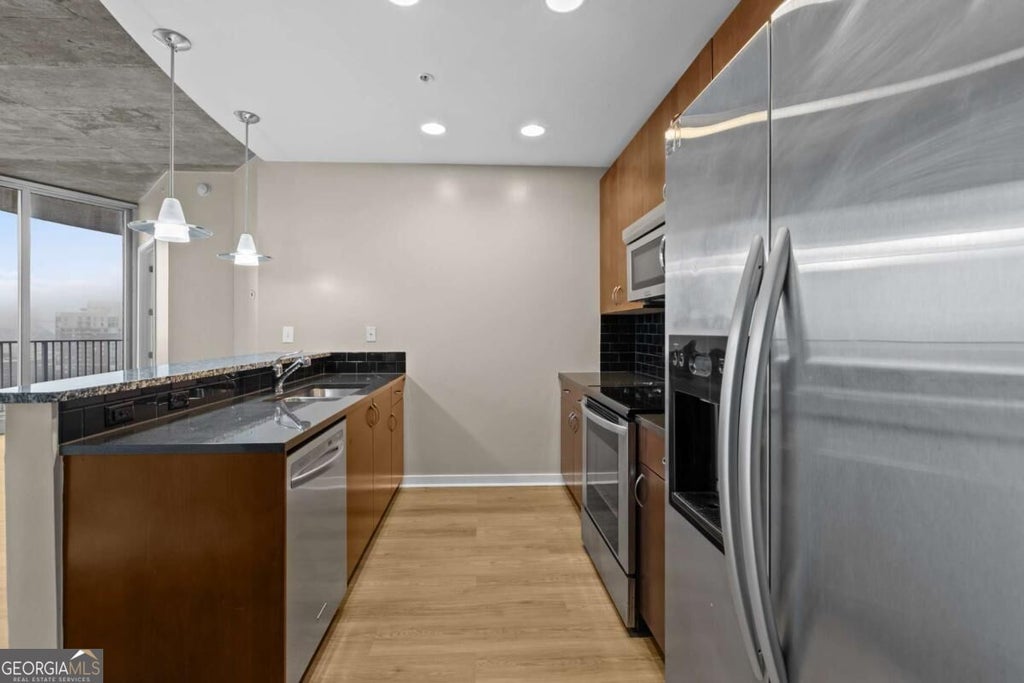 Photo of 400 W Peachtree Street NW #2206, Atlanta, GA 30308 (MLS # 10868986)