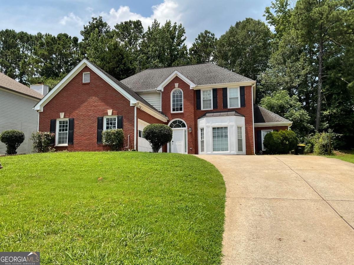 **Welcome Home!!** This stunning 4-bedroom home, located in an established community, offers the perfect blend of space and comfort with a master on the main, a flex room, family room, dining room, eat-in kitchen, and three large secondary bedrooms upstairs-but the real showstopper is the incredible outdoor living space, featuring an extra-large covered back porch and a spacious outdoor kitchen with a large island, perfect for entertaining! With fantastic community amenities for the whole family, this home truly has it all-you won't be disappointed!